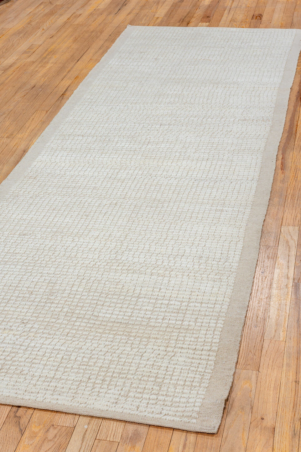 3' x 9' one-of-a-kind handmade vintage Tulu runner rug. Color palette: ivory, cream, beige