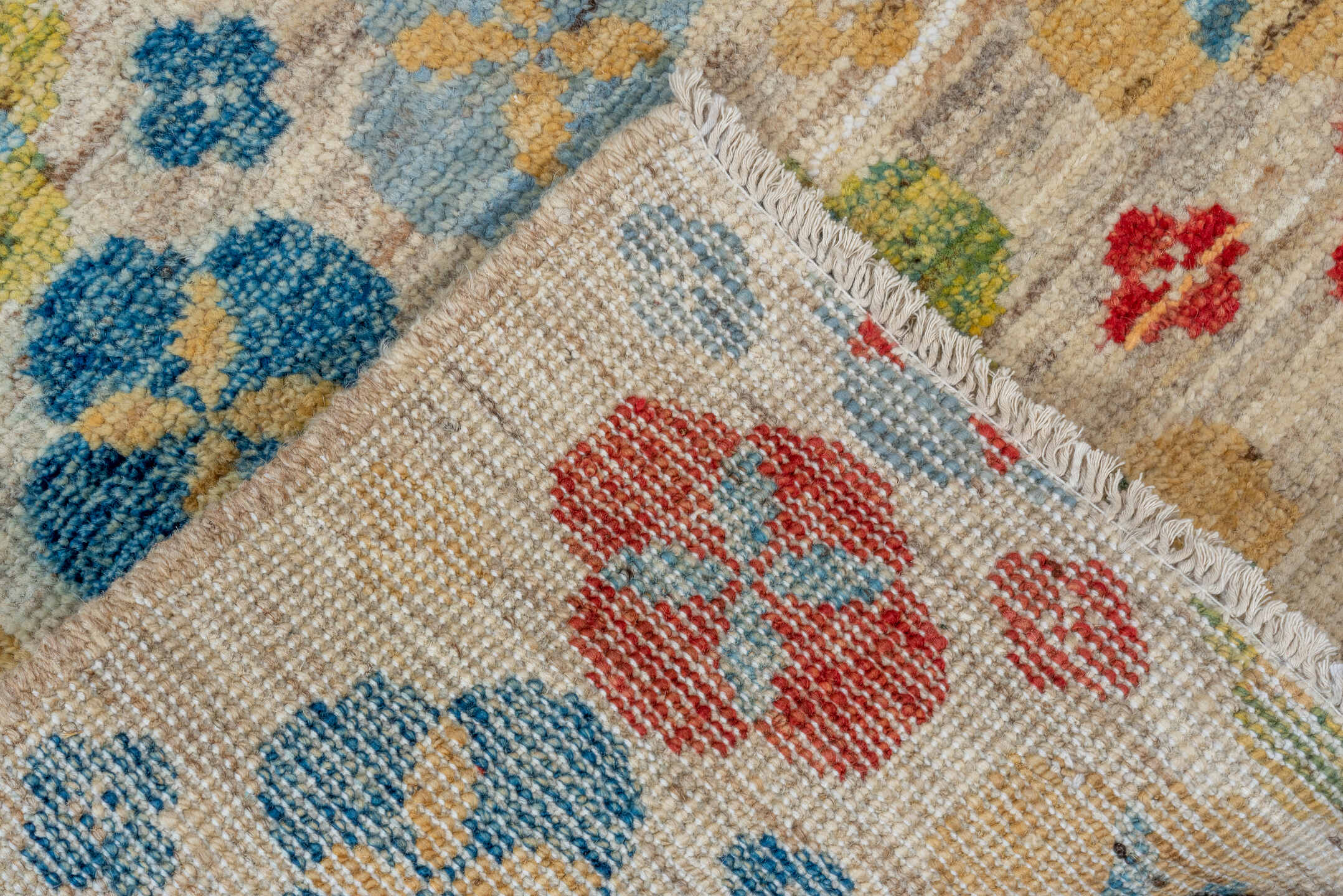 2' x 7' one-of-a-kind handmade vintage Tulu runner rug. Color palette: ivory, red, sky blue, gold, sage, camel, light blue