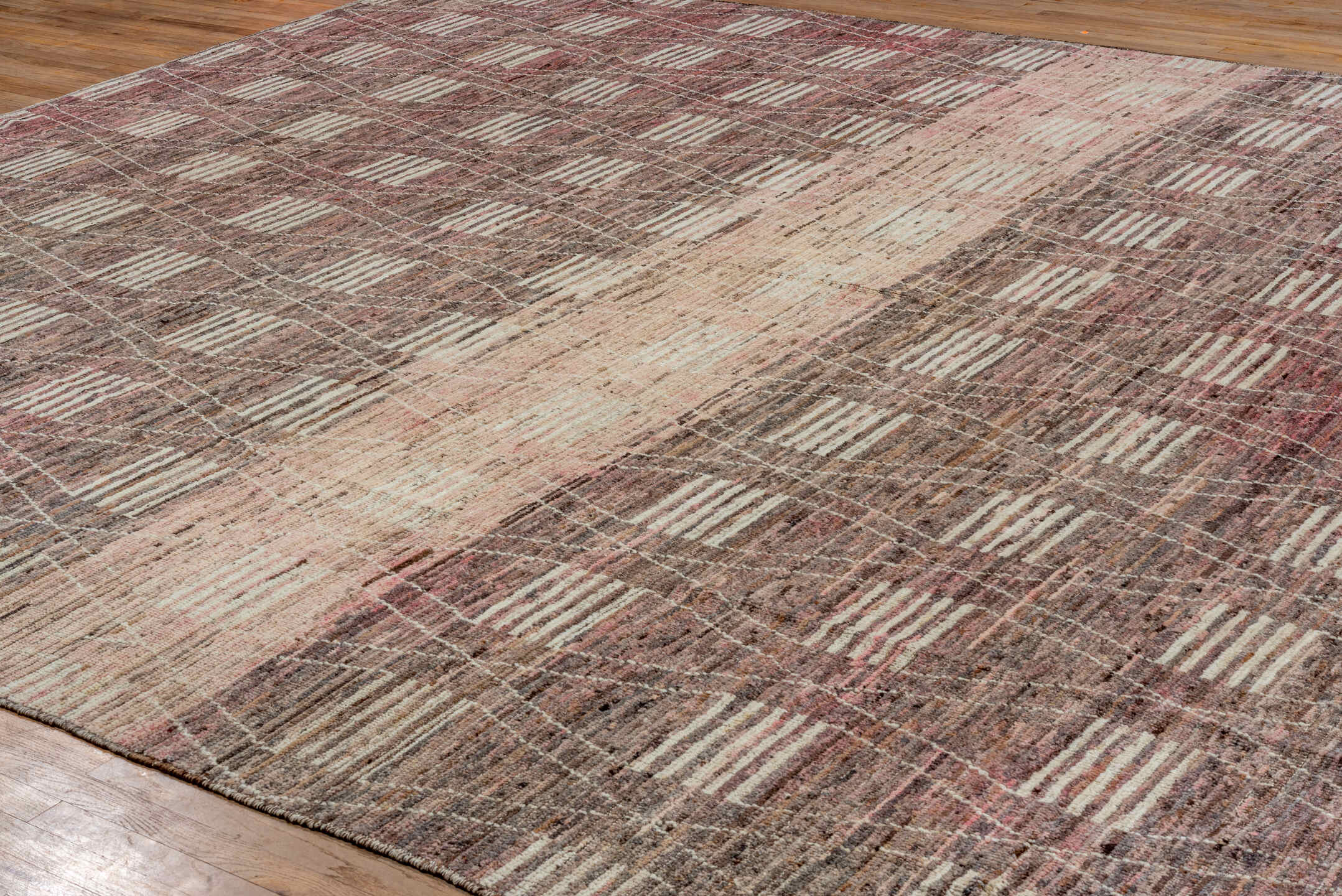 12' x 14' one-of-a-kind handmade vintage Tulu oversize rug. Color palette: rose, taupe, ivory, mauve, dusty pink, brown