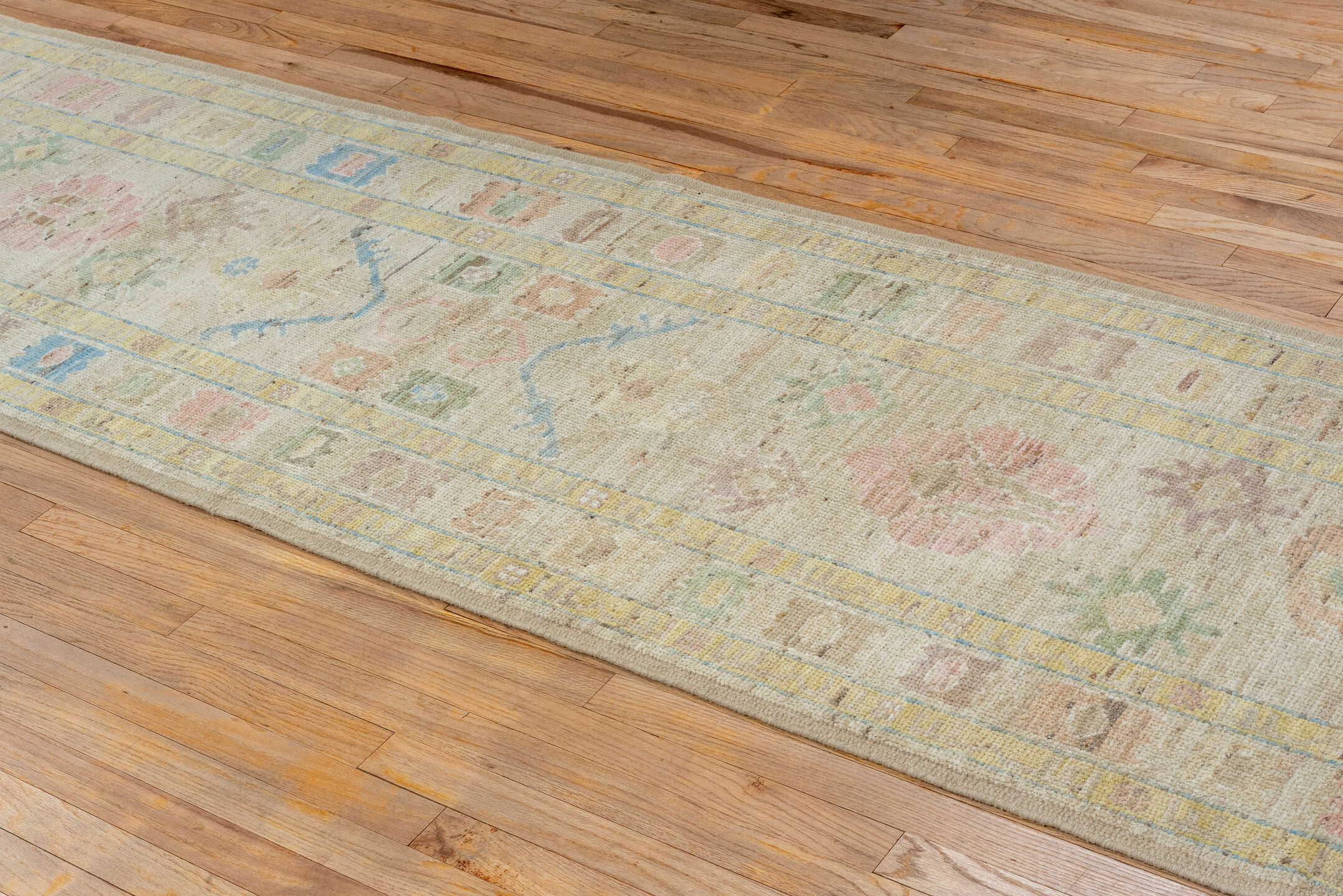 2' x 13' one-of-a-kind handmade vintage Tulu runner rug. Color palette: ivory, beige, pale blue, blush, sage, muted gold