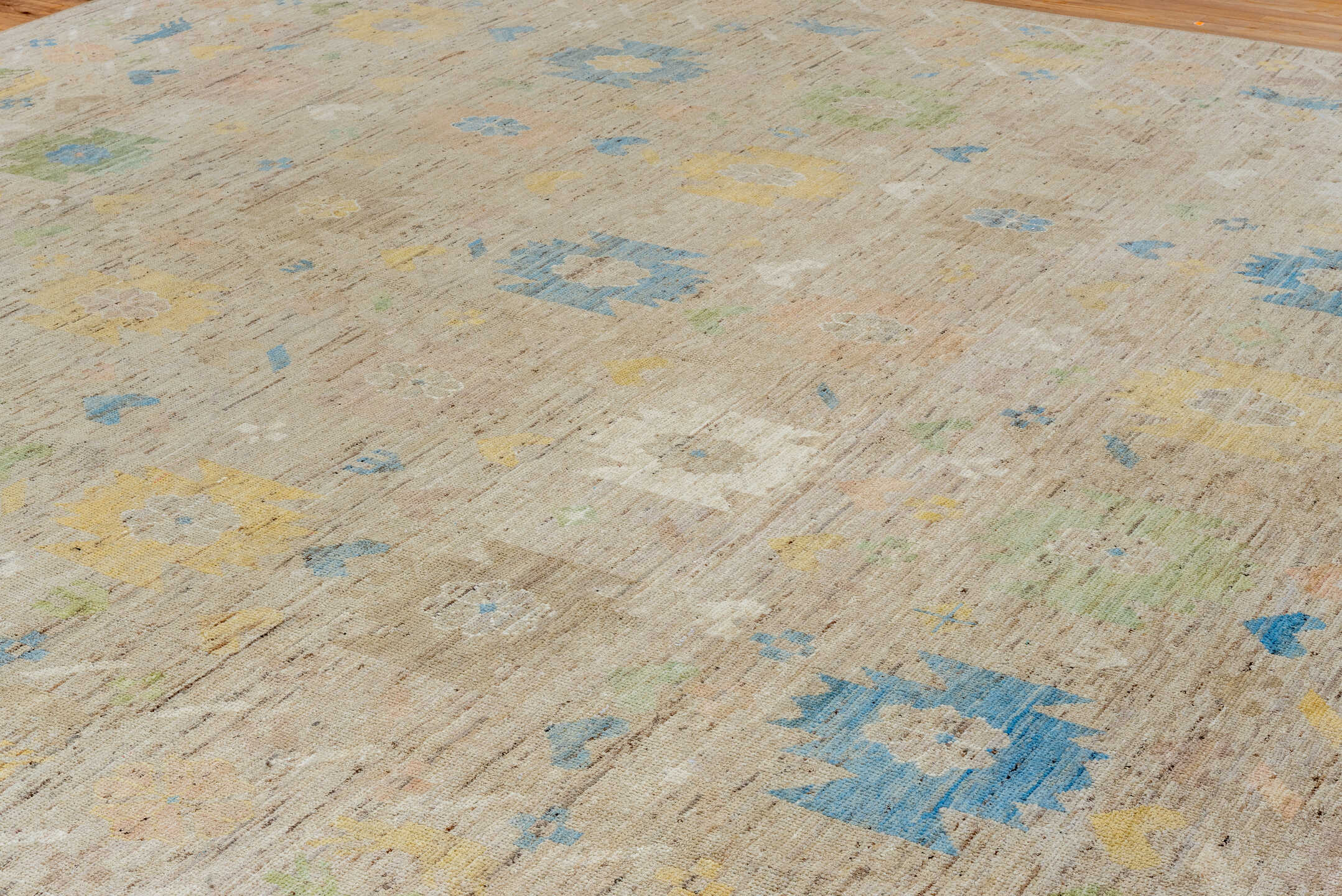 12' x 15' one-of-a-kind handmade vintage Tulu oversize rug. Color palette: beige, ivory, sky_blue, pale_yellow, sage, blush