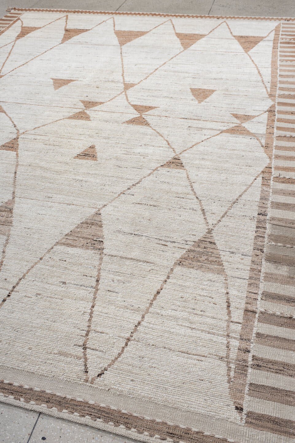 9' x 12' one-of-a-kind handmade vintage Tulu large size rug. Color palette: ivory, camel, taupe, beige, light brown, gray