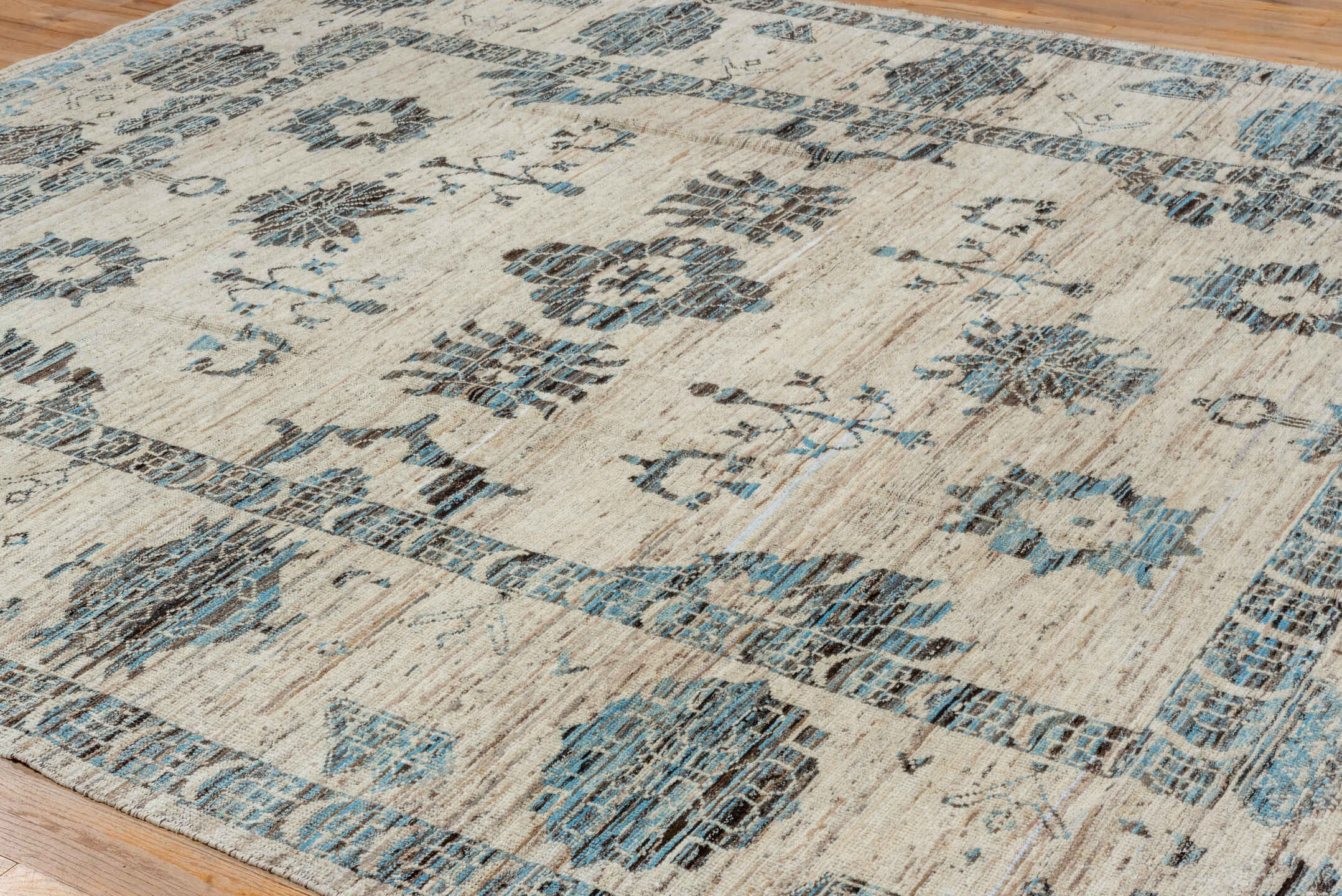 9' x 12' one-of-a-kind handmade vintage Tulu large size rug. Color palette: ivory, sky blue, charcoal, slate, taupe