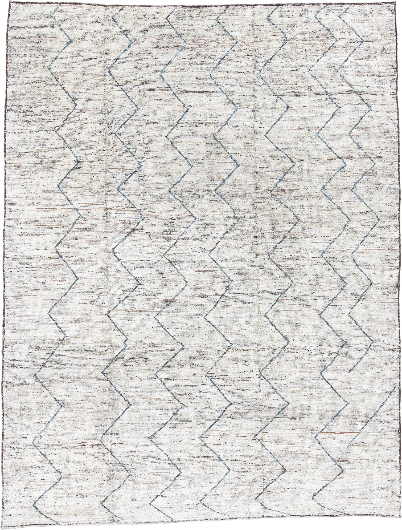 9' x 12' one-of-a-kind handmade vintage Tulu large size rug. Color palette: ivory, blue, taupe, brown, charcoal, beige, gray