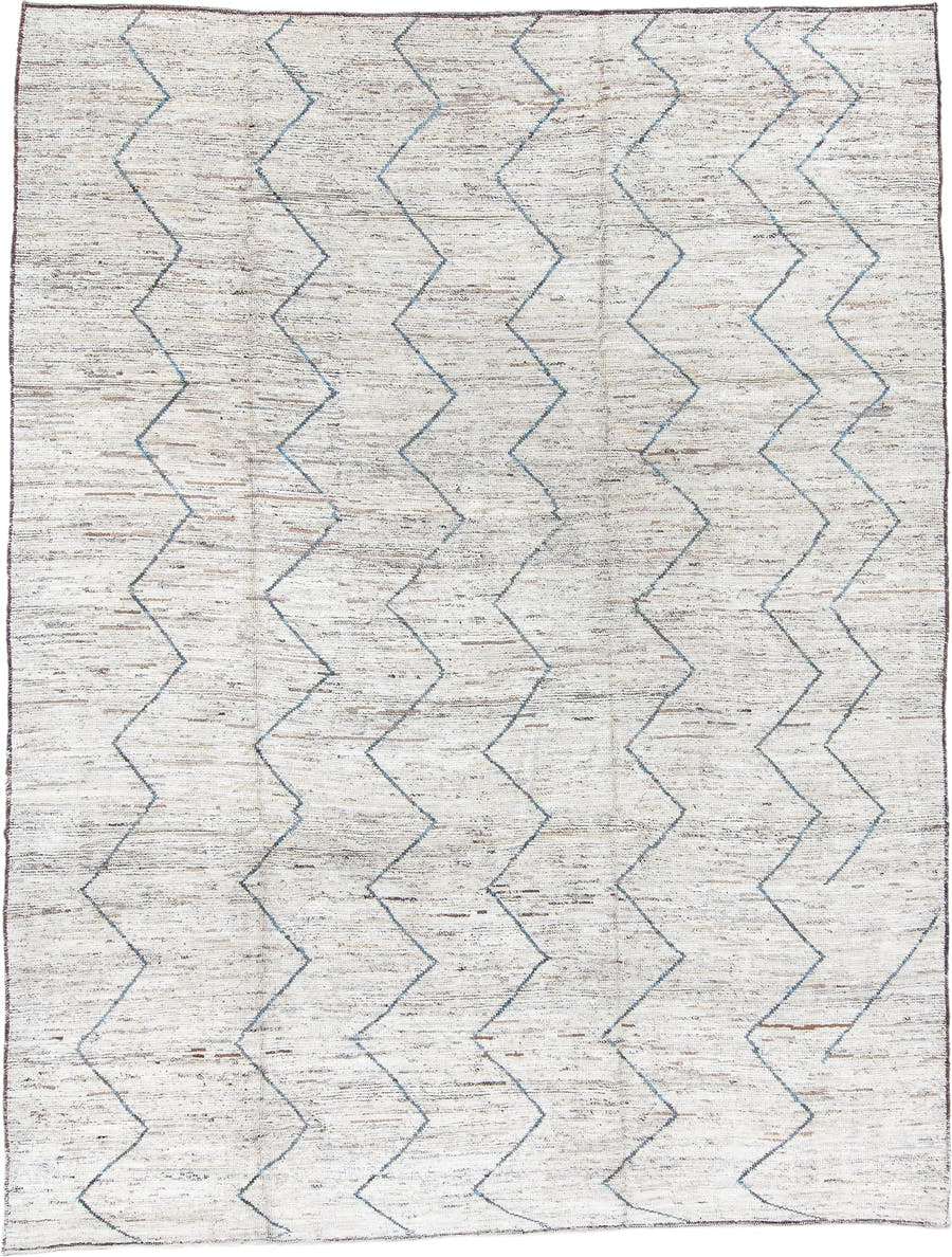 9' x 12' one-of-a-kind handmade vintage Tulu large size rug. Color palette: ivory, blue, taupe, brown, charcoal, beige, gray