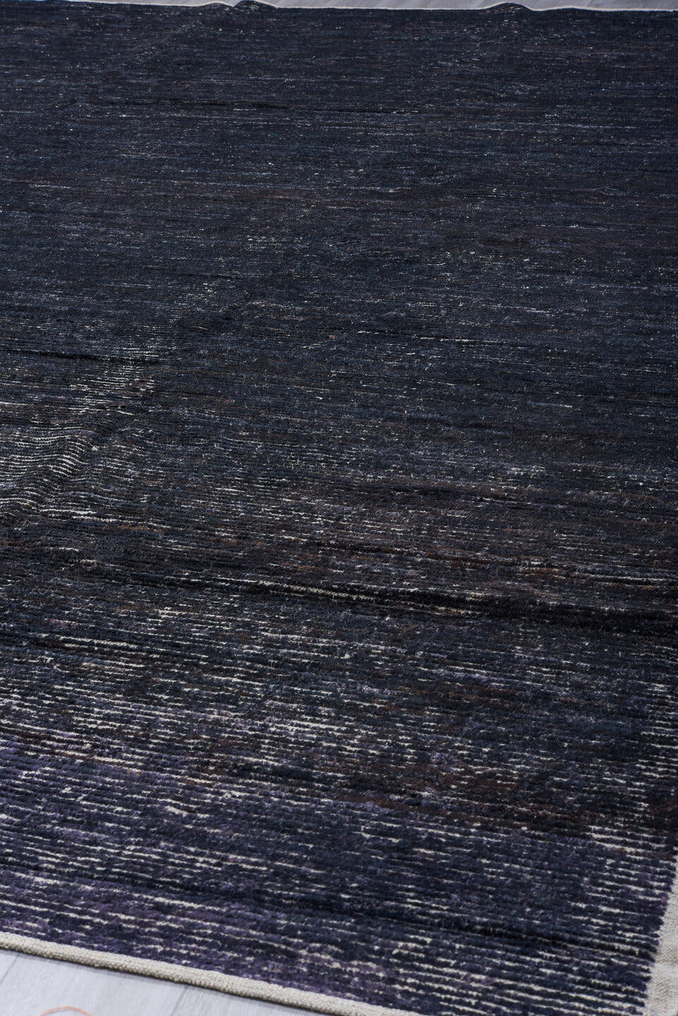 11' x 14' one-of-a-kind handmade vintage Tulu oversize rug. Color palette: charcoal, indigo, ivory, slate, blue gray, black
