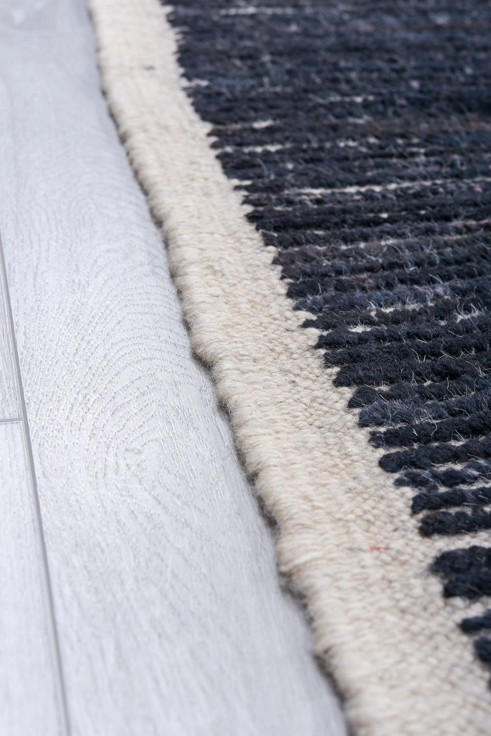 11' x 14' one-of-a-kind handmade vintage Tulu oversize rug. Color palette: charcoal, indigo, ivory, slate, blue gray, black