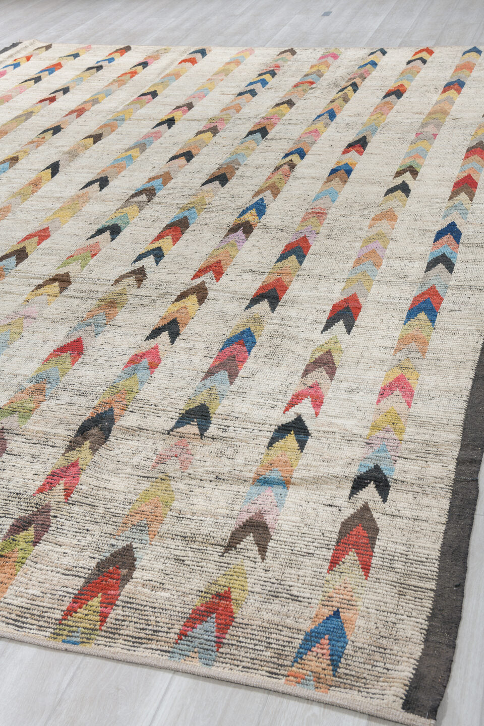 10' x 13' one-of-a-kind handmade vintage Tulu large size rug. Color palette: ivory, charcoal, coral, cobalt, peach, gold