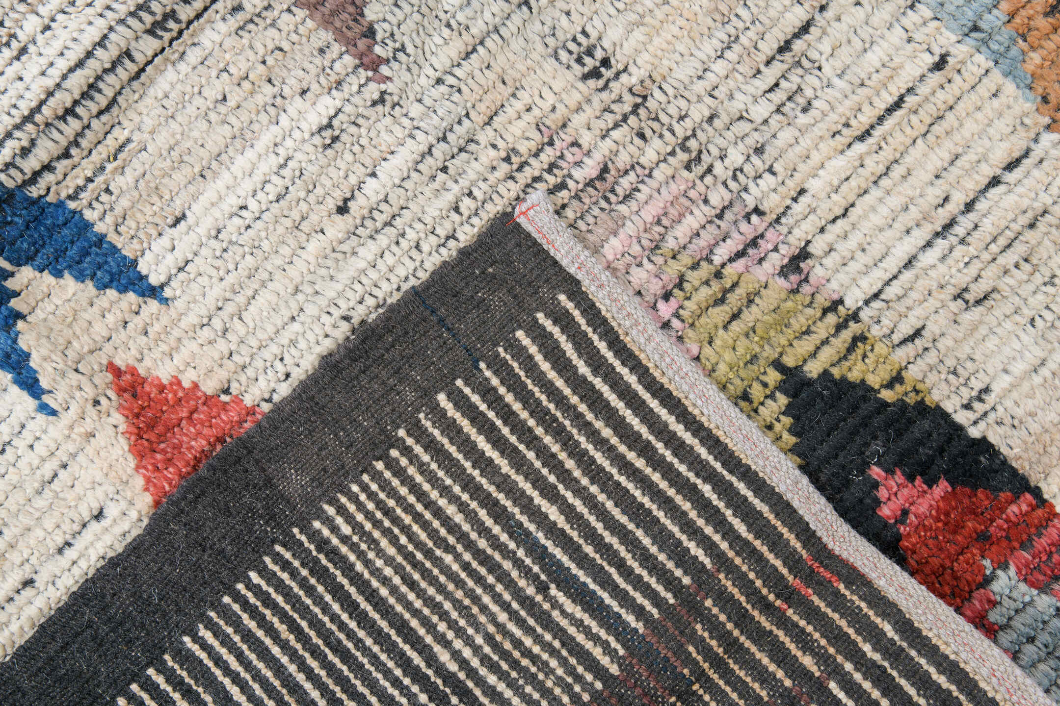 10' x 13' one-of-a-kind handmade vintage Tulu large size rug. Color palette: ivory, charcoal, coral, cobalt, peach, gold