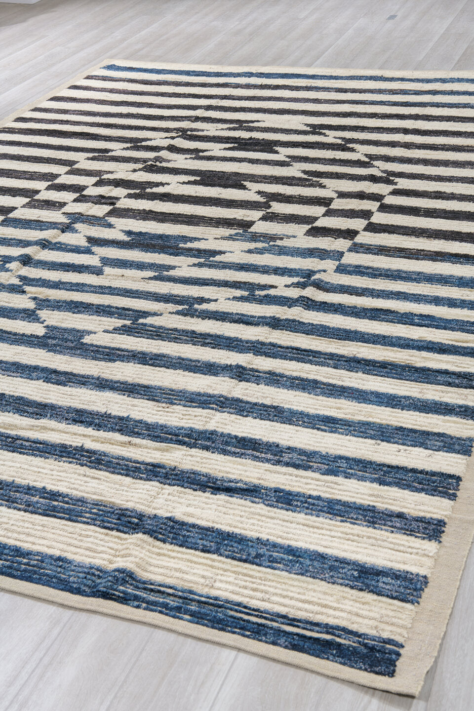 9' x 12' one-of-a-kind handmade vintage Tulu large size rug. Color palette: ivory, indigo, charcoal, black, purple, gray