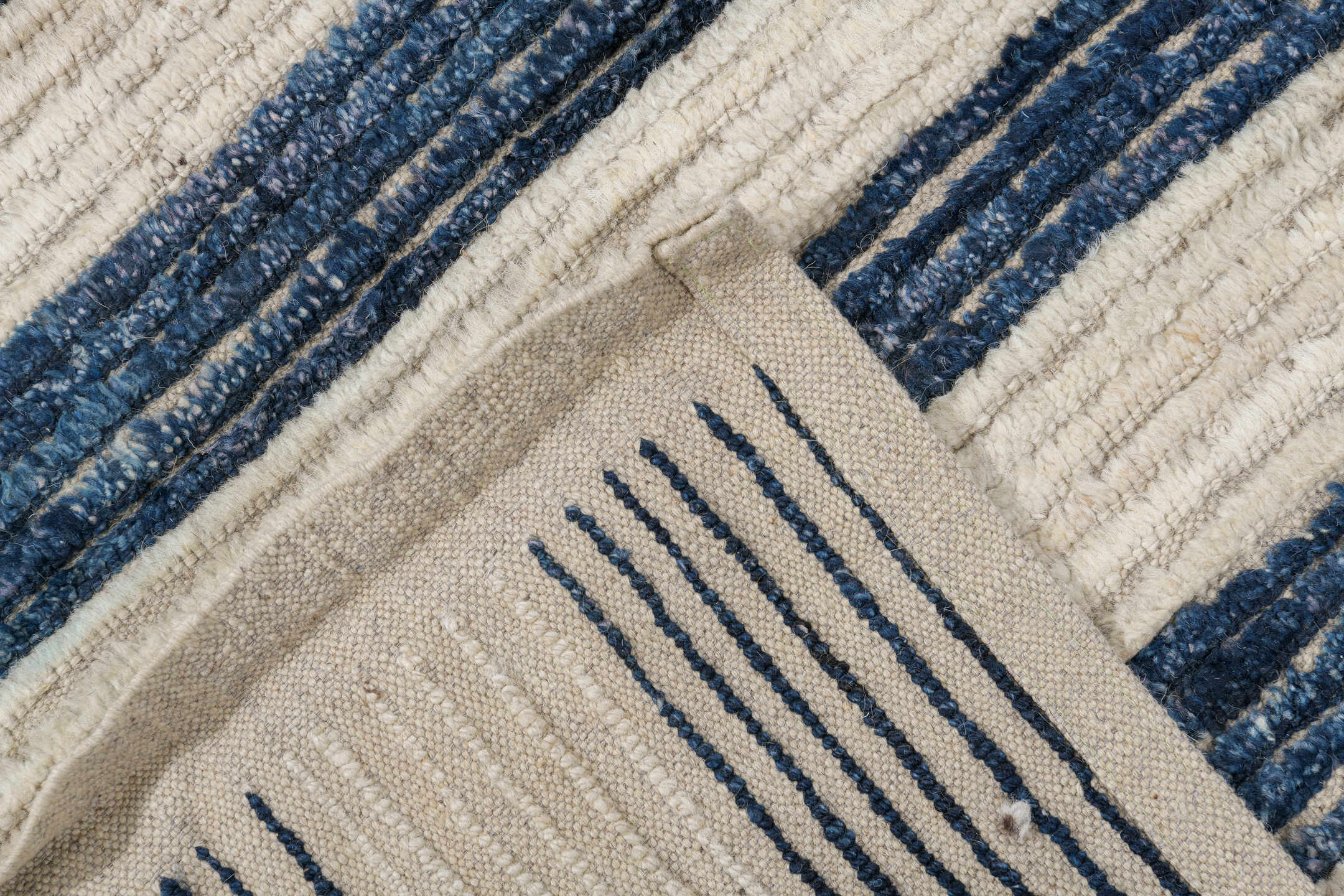 9' x 12' one-of-a-kind handmade vintage Tulu large size rug. Color palette: ivory, indigo, charcoal, black, purple, gray