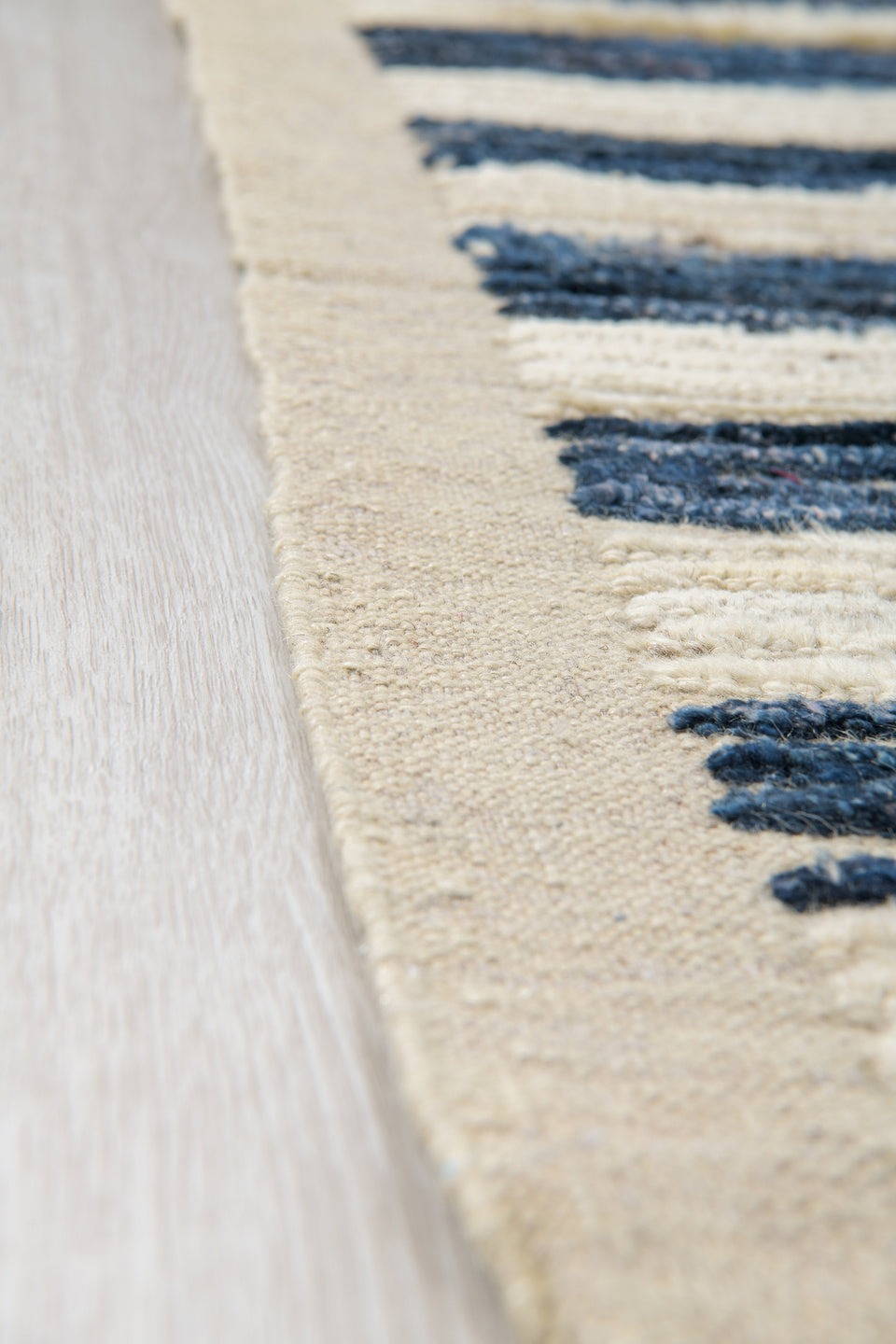 9' x 12' one-of-a-kind handmade vintage Tulu large size rug. Color palette: ivory, indigo, charcoal, black, purple, gray