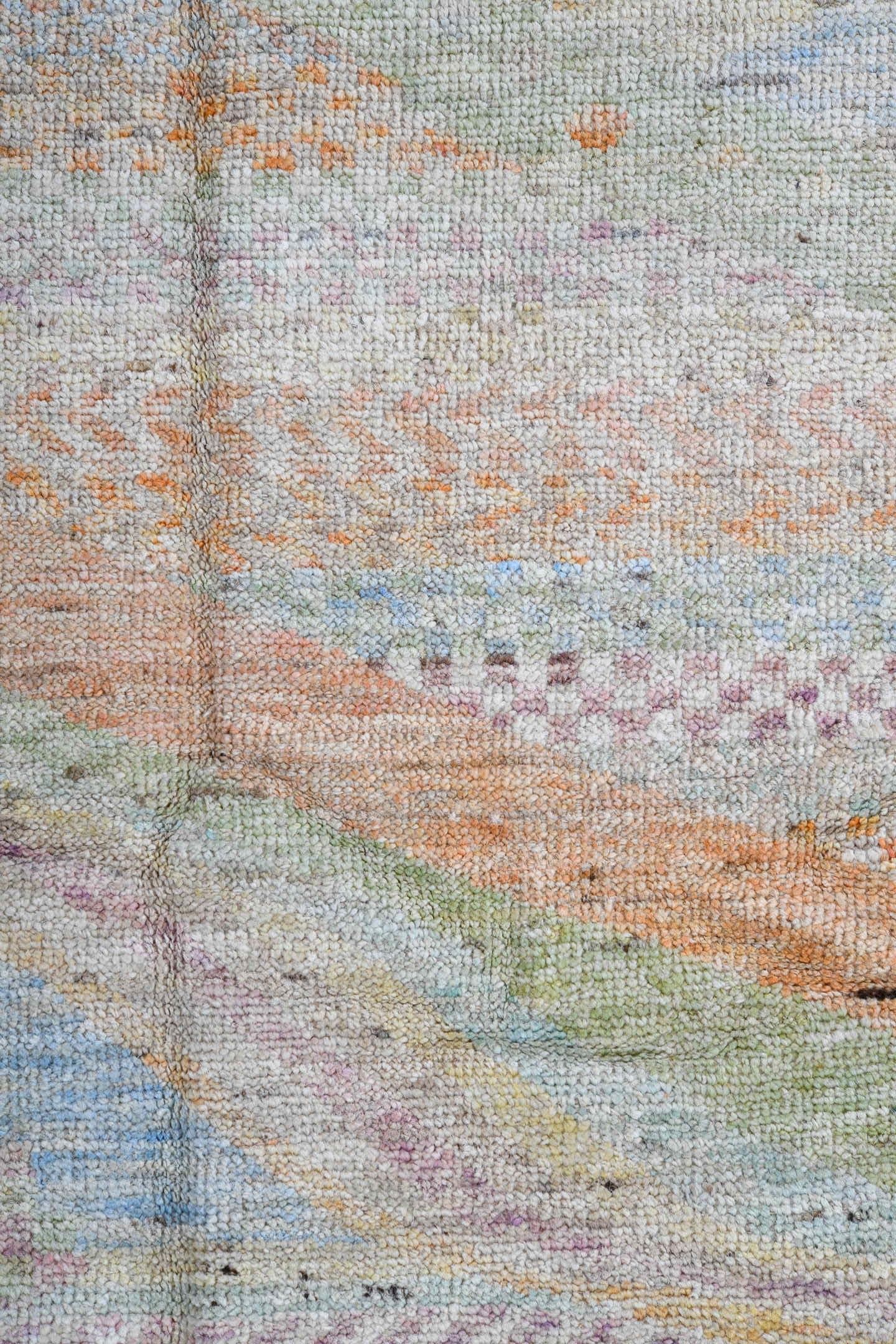 4' x 6' one-of-a-kind handmade vintage Tulu small size rug. Color palette: ivory, pale aqua, apricot, sage, lavender, taupe