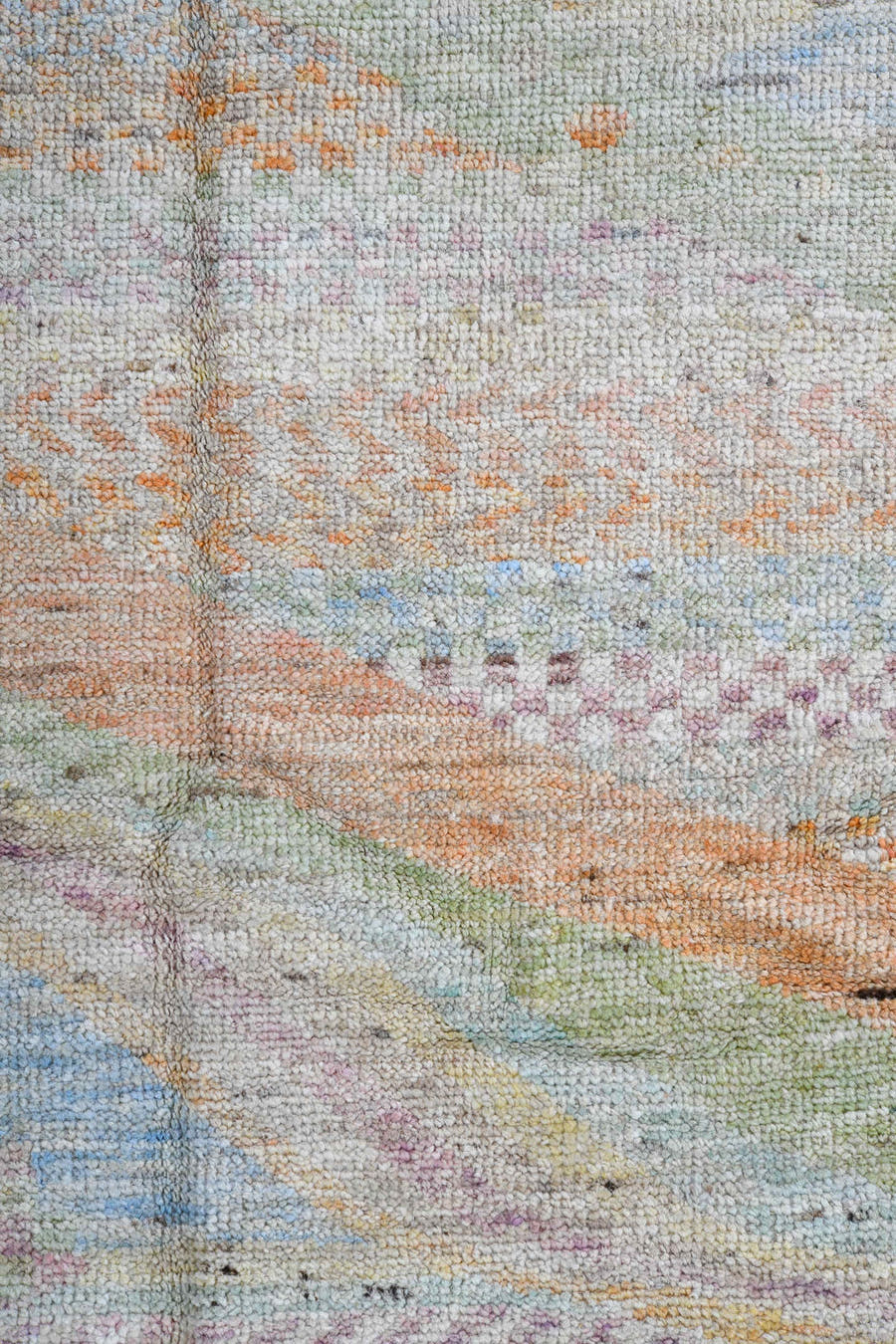 4' x 6' one-of-a-kind handmade vintage Tulu small size rug. Color palette: ivory, pale aqua, apricot, sage, lavender, taupe