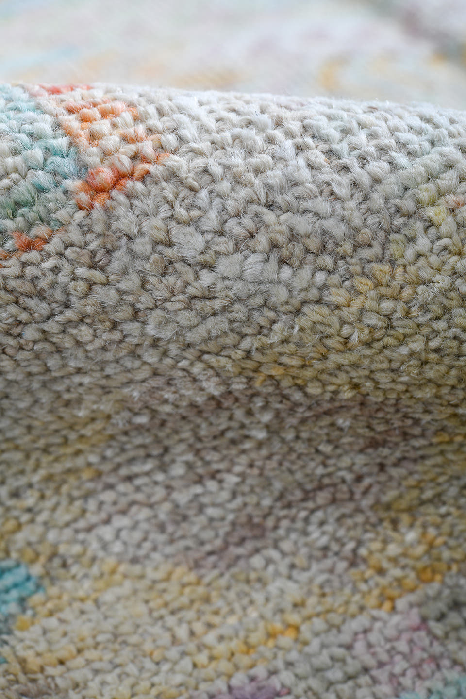 4' x 6' one-of-a-kind handmade vintage Tulu small size rug. Color palette: ivory, pale aqua, apricot, sage, lavender, taupe