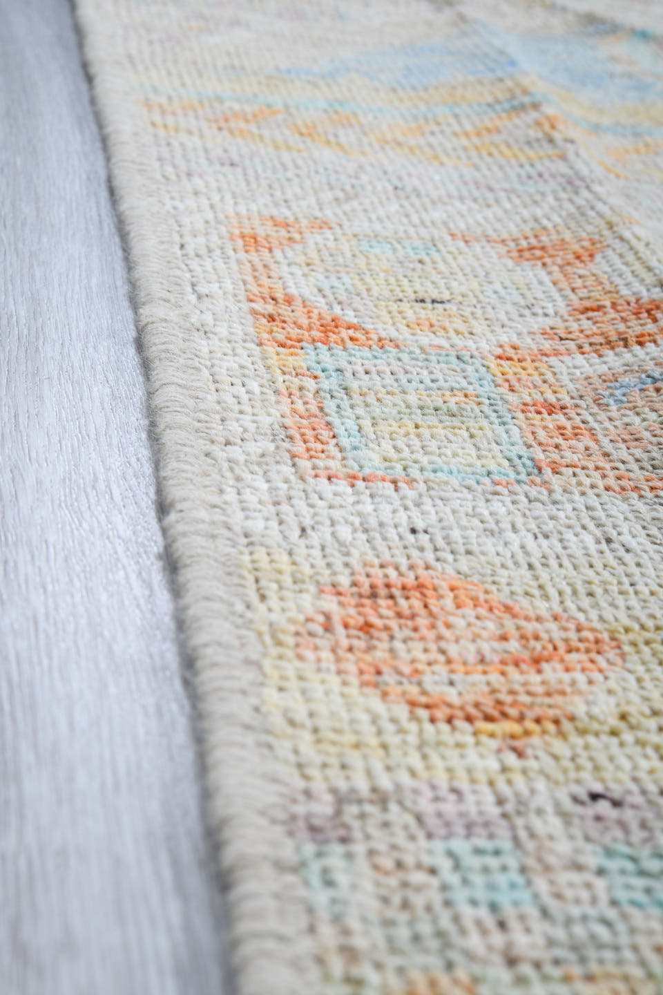 4' x 6' one-of-a-kind handmade vintage Tulu small size rug. Color palette: ivory, pale aqua, apricot, sage, lavender, taupe