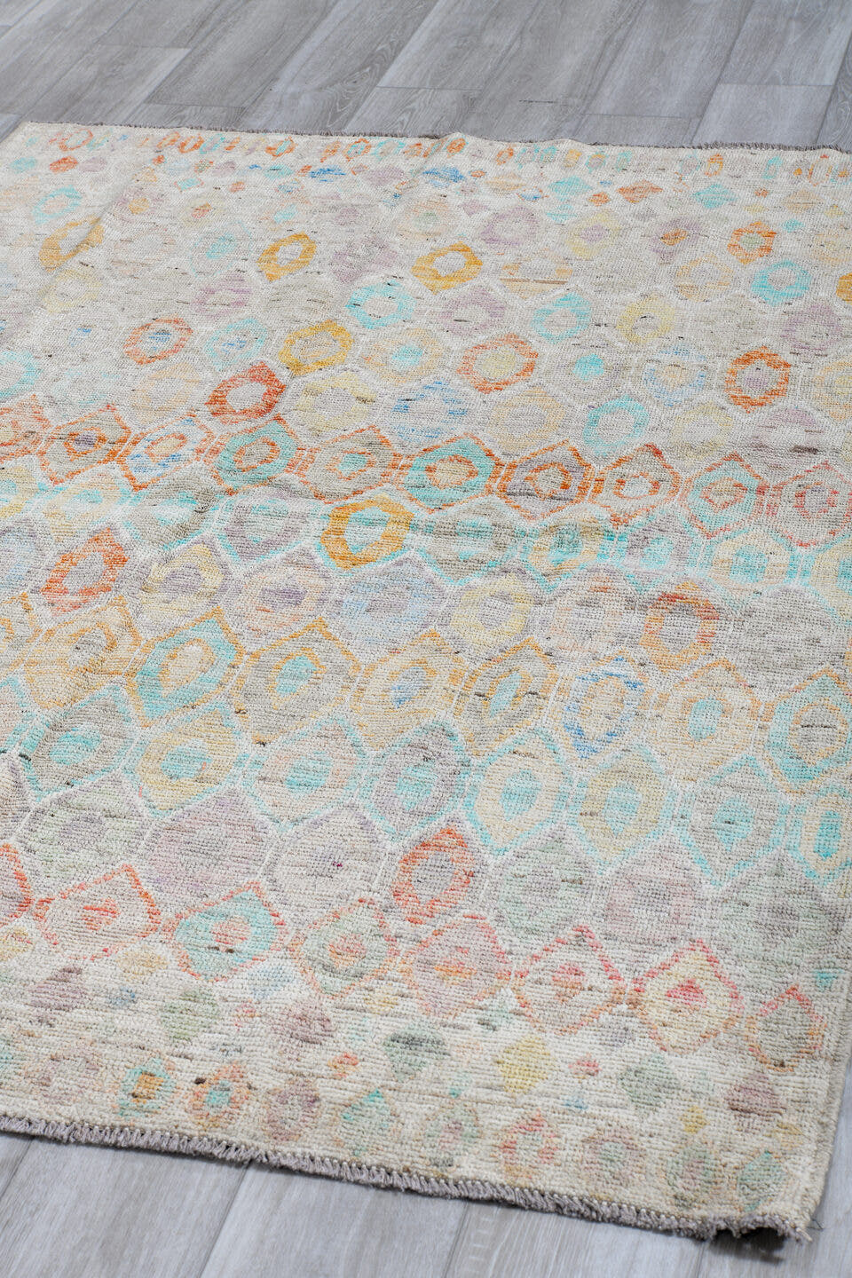 5' x 6' one-of-a-kind handmade vintage Tulu rug. Color palette: ivory, aqua, coral, saffron, lavender, pale blue, taupe