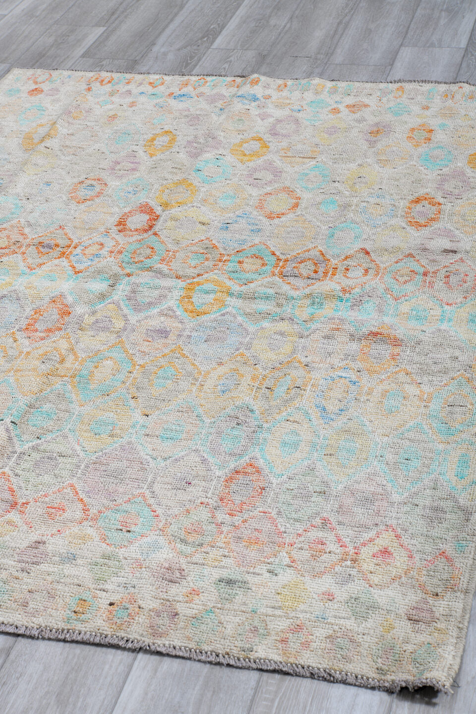 5' x 6' one-of-a-kind handmade vintage Tulu rug. Color palette: ivory, aqua, coral, saffron, lavender, pale blue, taupe