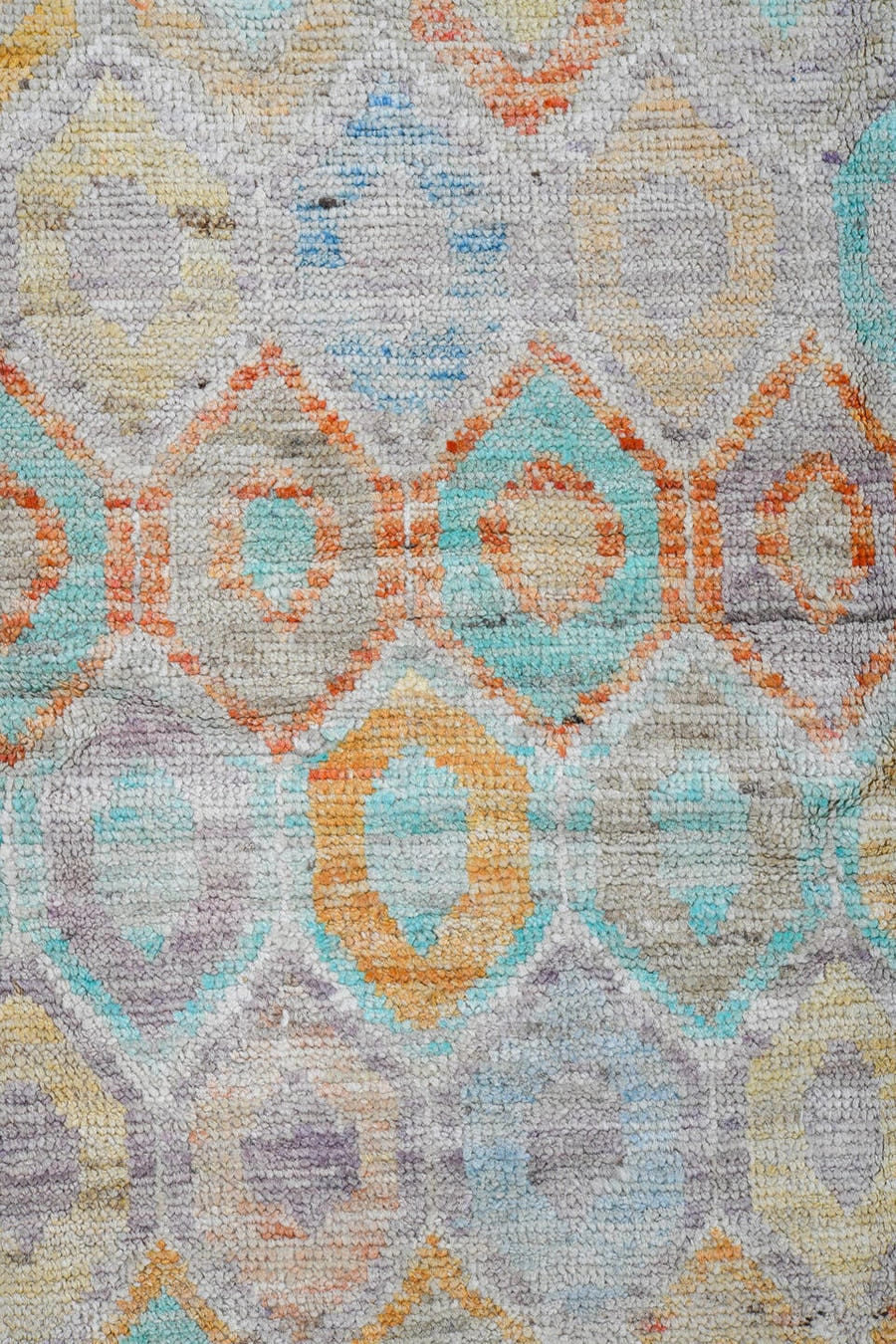 5' x 6' one-of-a-kind handmade vintage Tulu rug. Color palette: ivory, aqua, coral, saffron, lavender, pale blue, taupe