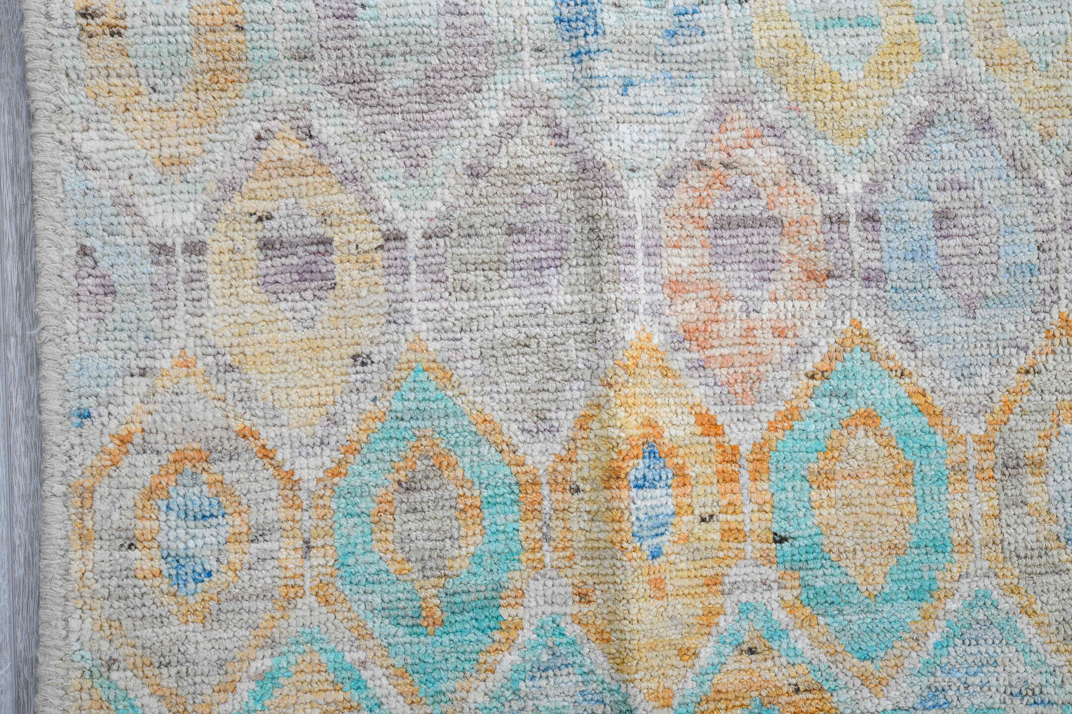 5' x 6' one-of-a-kind handmade vintage Tulu rug. Color palette: ivory, aqua, coral, saffron, lavender, pale blue, taupe
