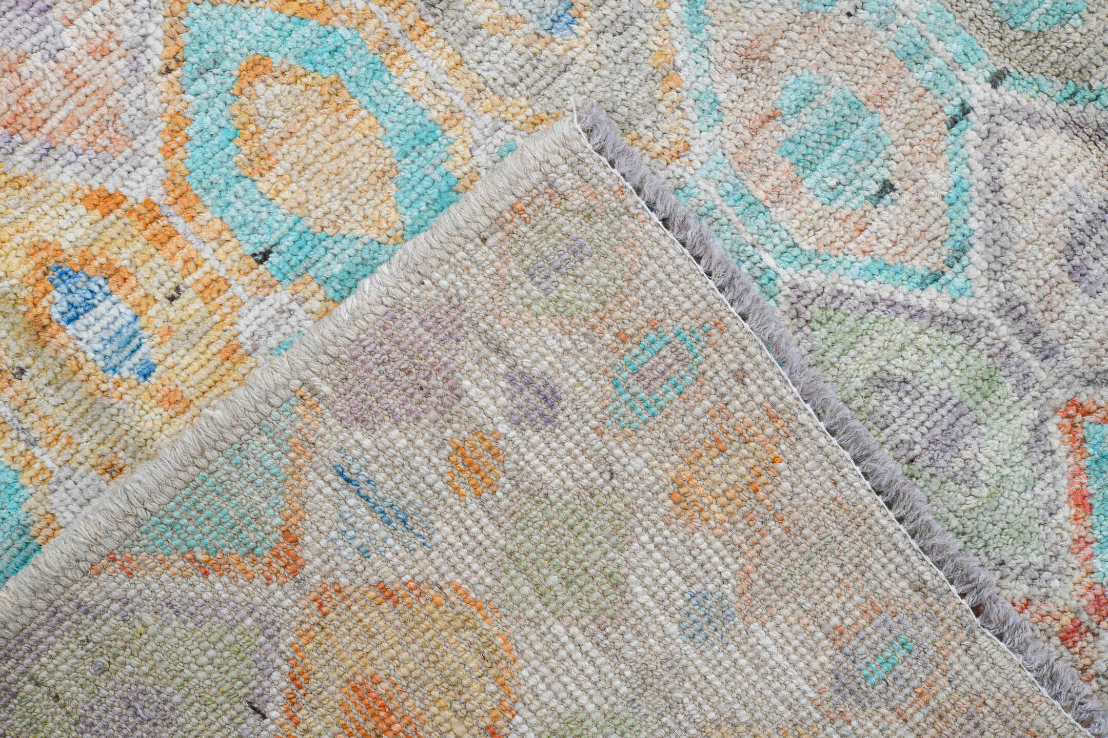 5' x 6' one-of-a-kind handmade vintage Tulu rug. Color palette: ivory, aqua, coral, saffron, lavender, pale blue, taupe