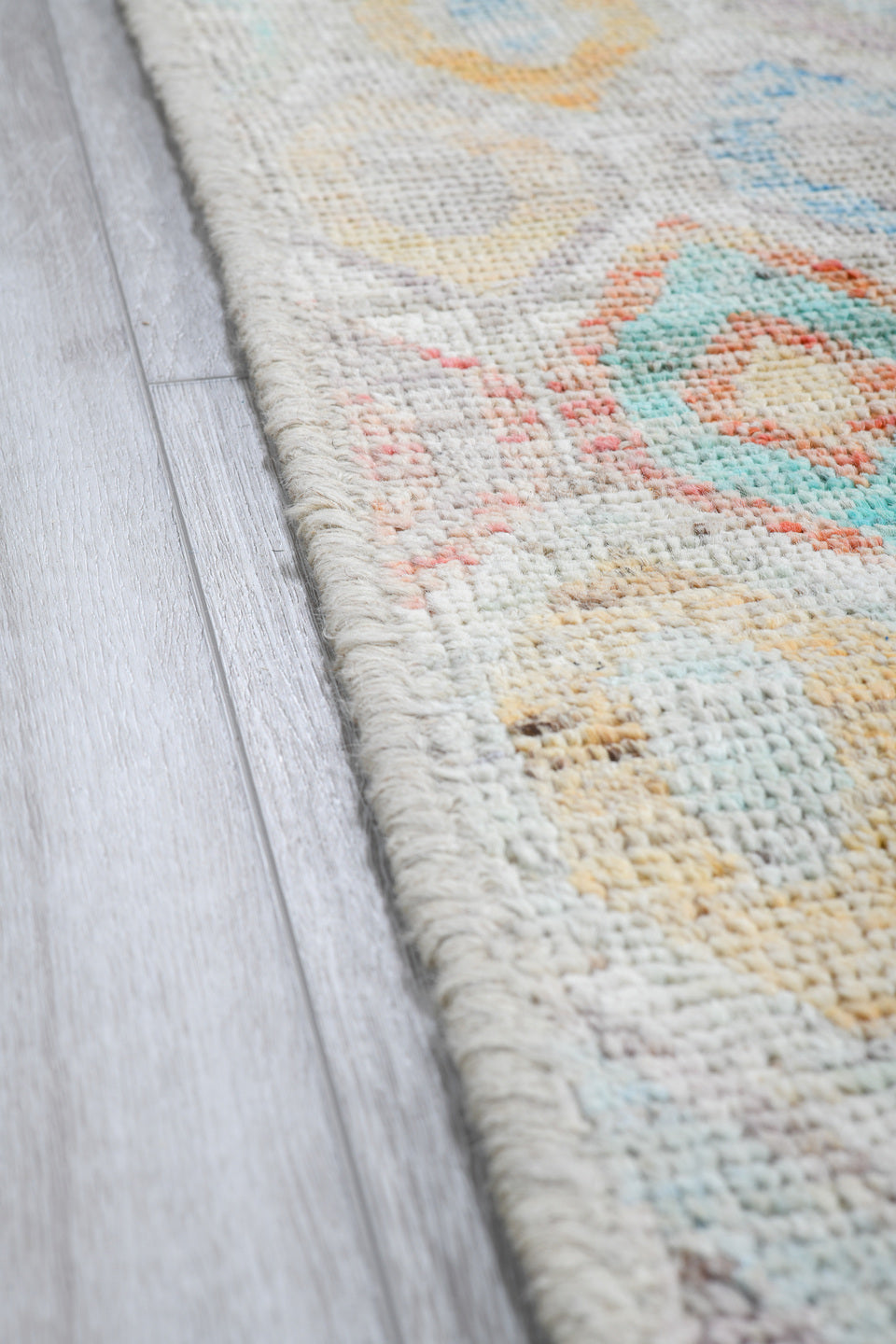5' x 6' one-of-a-kind handmade vintage Tulu rug. Color palette: ivory, aqua, coral, saffron, lavender, pale blue, taupe