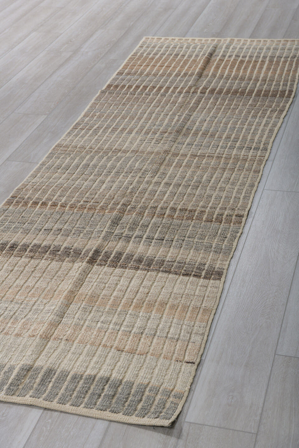 3' x 9' one-of-a-kind handmade vintage Tulu runner rug. Color palette: ivory, taupe, charcoal, camel, gray, brown, beige