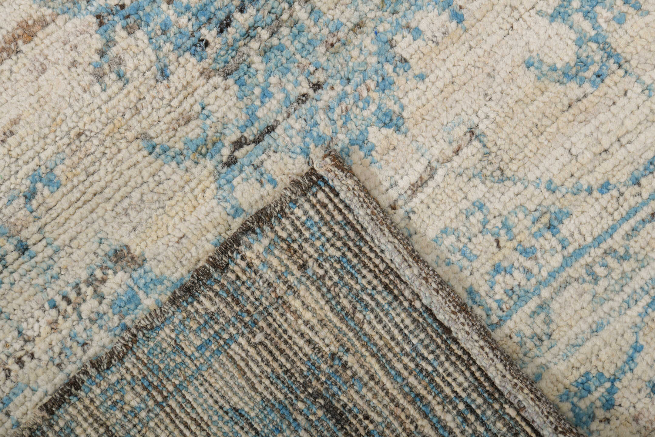 3' x 8' one-of-a-kind handmade vintage Tulu runner rug. Color palette: ivory, sky blue, taupe, slate, cream, light blue
