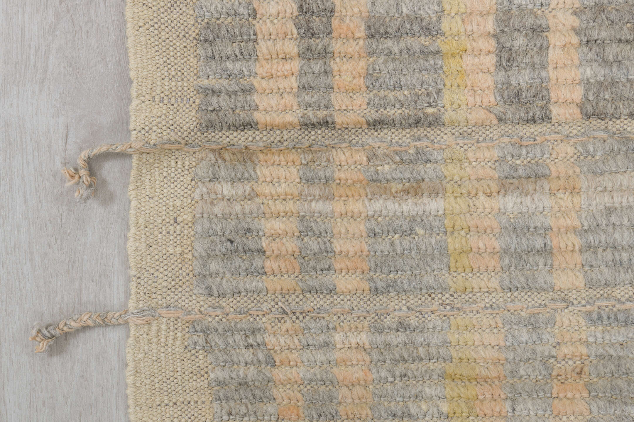 2' x 9' one-of-a-kind handmade vintage Tulu runner rug. Color palette: ivory, pale gold, gray, charcoal, cream, gold, black