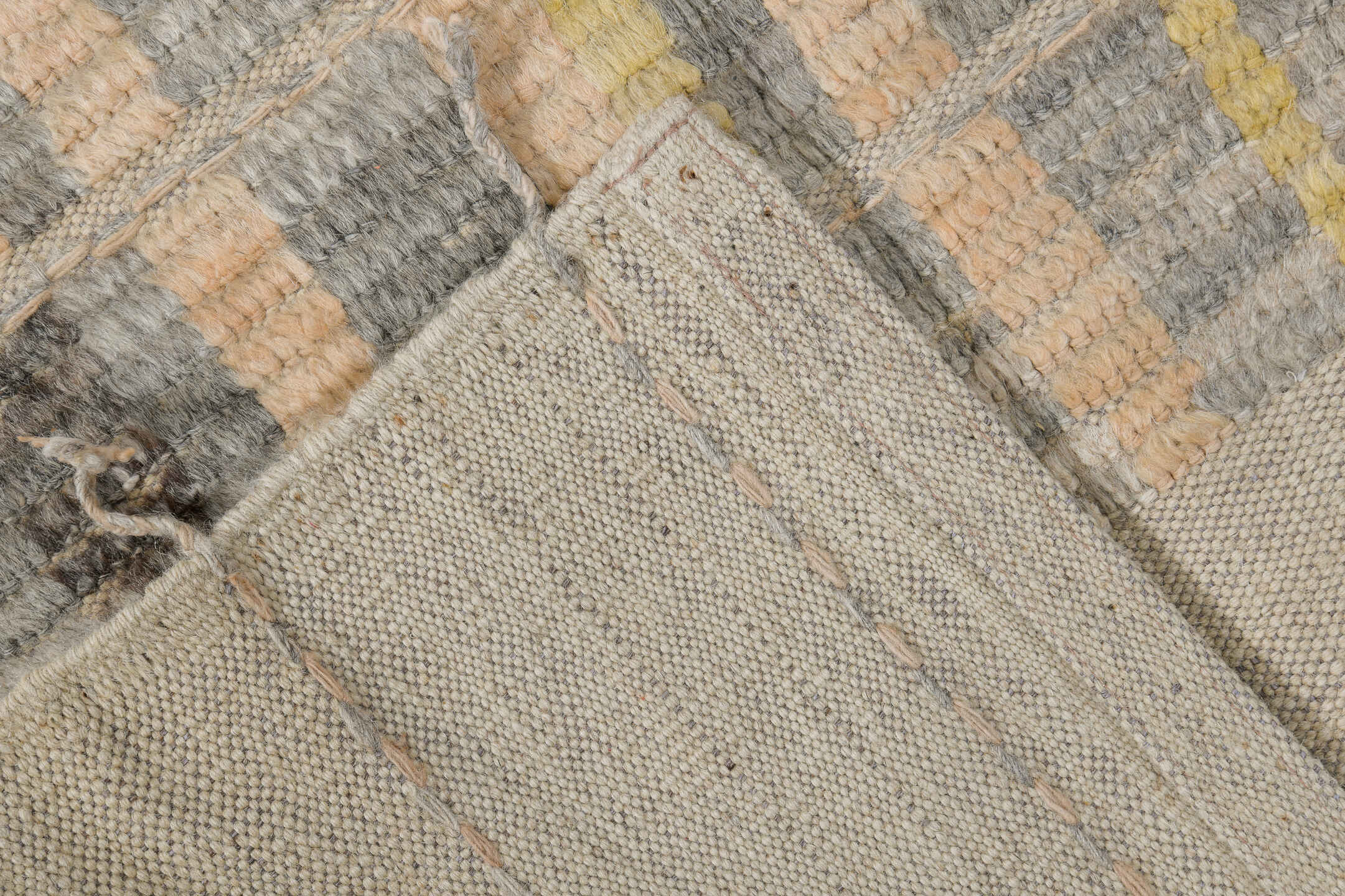 2' x 9' one-of-a-kind handmade vintage Tulu runner rug. Color palette: ivory, pale gold, gray, charcoal, cream, gold, black