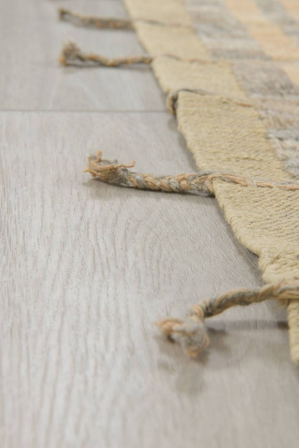 2' x 9' one-of-a-kind handmade vintage Tulu runner rug. Color palette: ivory, pale gold, gray, charcoal, cream, gold, black