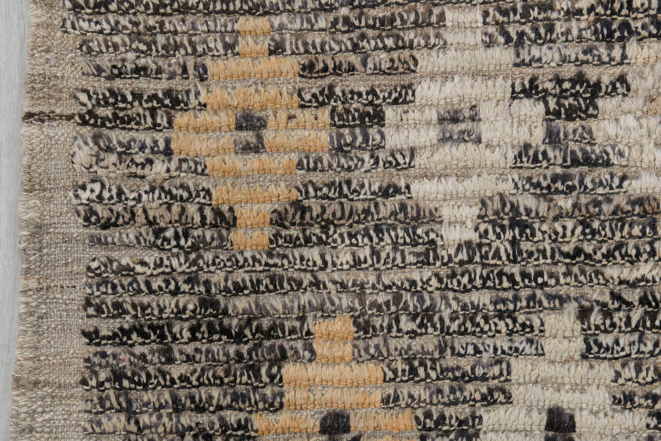 3' x 11' one-of-a-kind handmade vintage Tulu runner rug. Color palette: charcoal, ivory, blue, cream, peach, gray, black