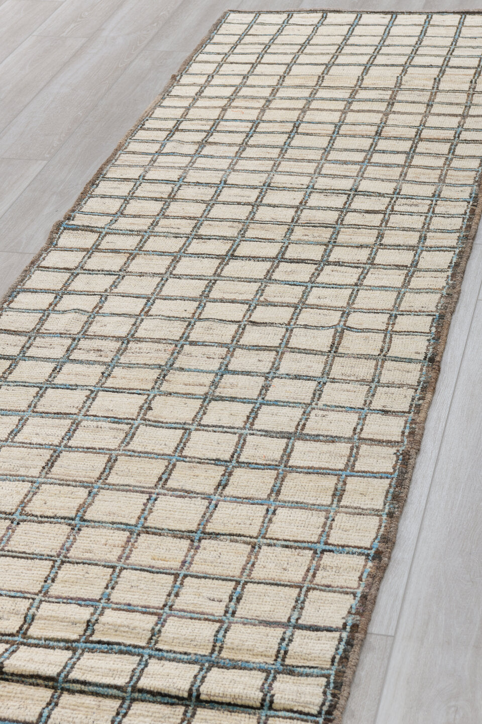3' x 9' one-of-a-kind handmade vintage Tulu runner rug. Color palette: ivory, charcoal, taupe, black, gray, beige