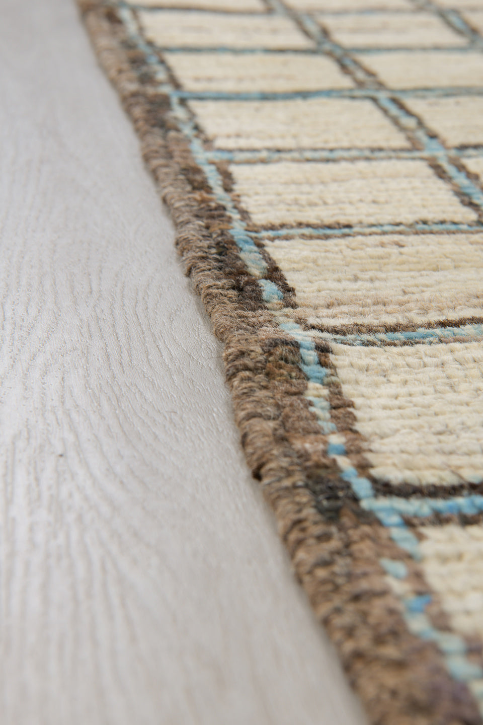 3' x 9' one-of-a-kind handmade vintage Tulu runner rug. Color palette: ivory, charcoal, taupe, black, gray, beige