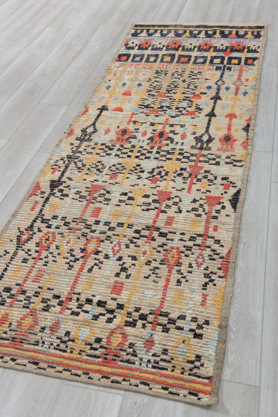 3' x 9' one-of-a-kind handmade vintage Tulu runner rug. Color palette: ivory, charcoal, coral, pale blue, camel, taupe