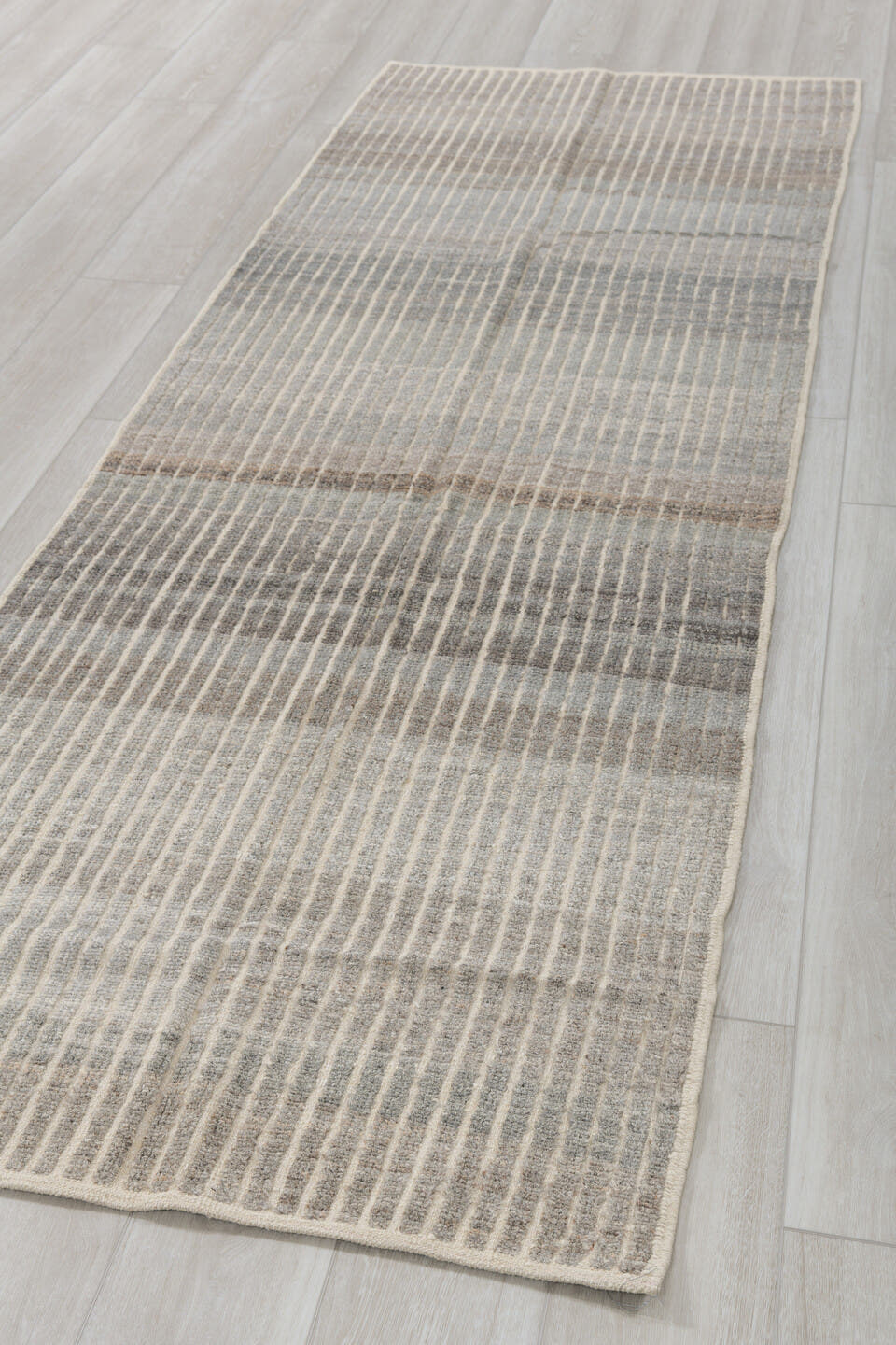 3' x 9' one-of-a-kind handmade vintage Tulu runner rug. Color palette: ivory, gray, taupe, brown, charcoal, beige, black