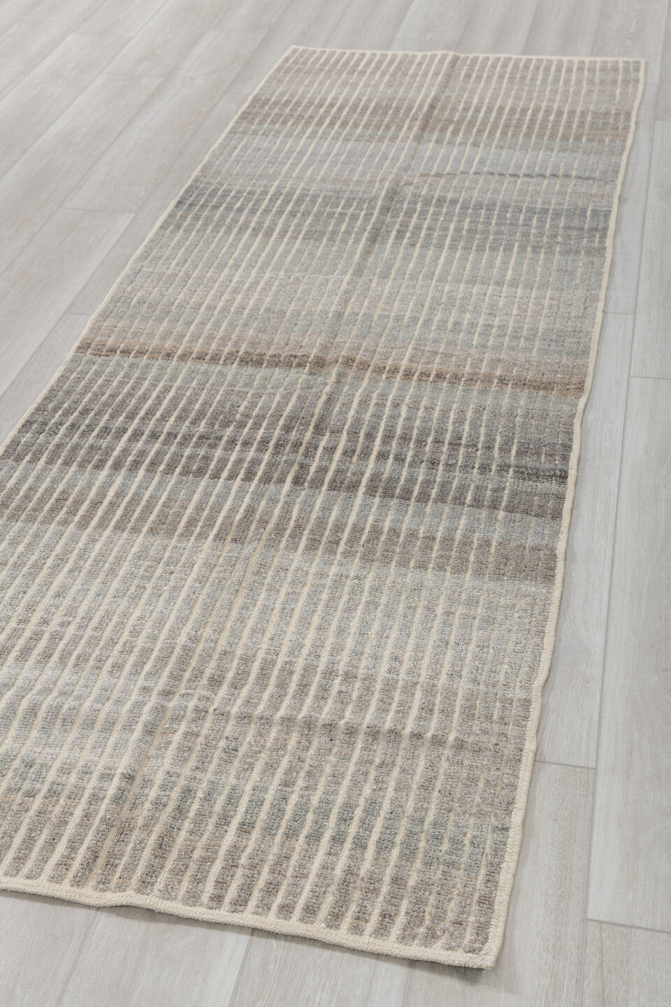 3' x 9' one-of-a-kind handmade vintage Tulu runner rug. Color palette: ivory, gray, taupe, brown, charcoal, beige, black