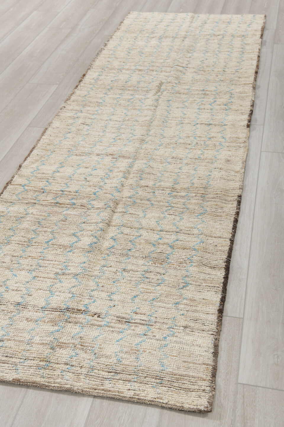 3' x 10' one-of-a-kind handmade vintage Tulu runner rug. Color palette: ivory, blue gray, taupe, charcoal, gray, blue, beige