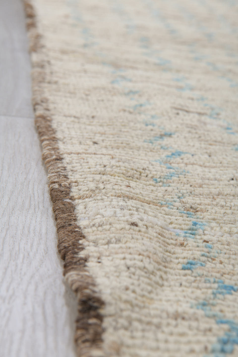 3' x 10' one-of-a-kind handmade vintage Tulu runner rug. Color palette: ivory, blue gray, taupe, charcoal, gray, blue, beige