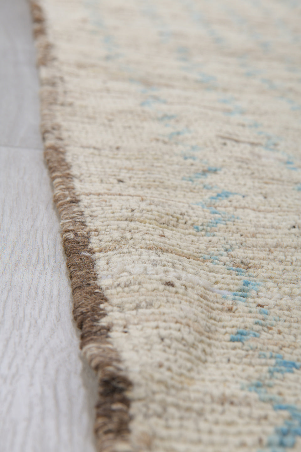3' x 10' one-of-a-kind handmade vintage Tulu runner rug. Color palette: ivory, blue gray, taupe, charcoal, gray, blue, beige