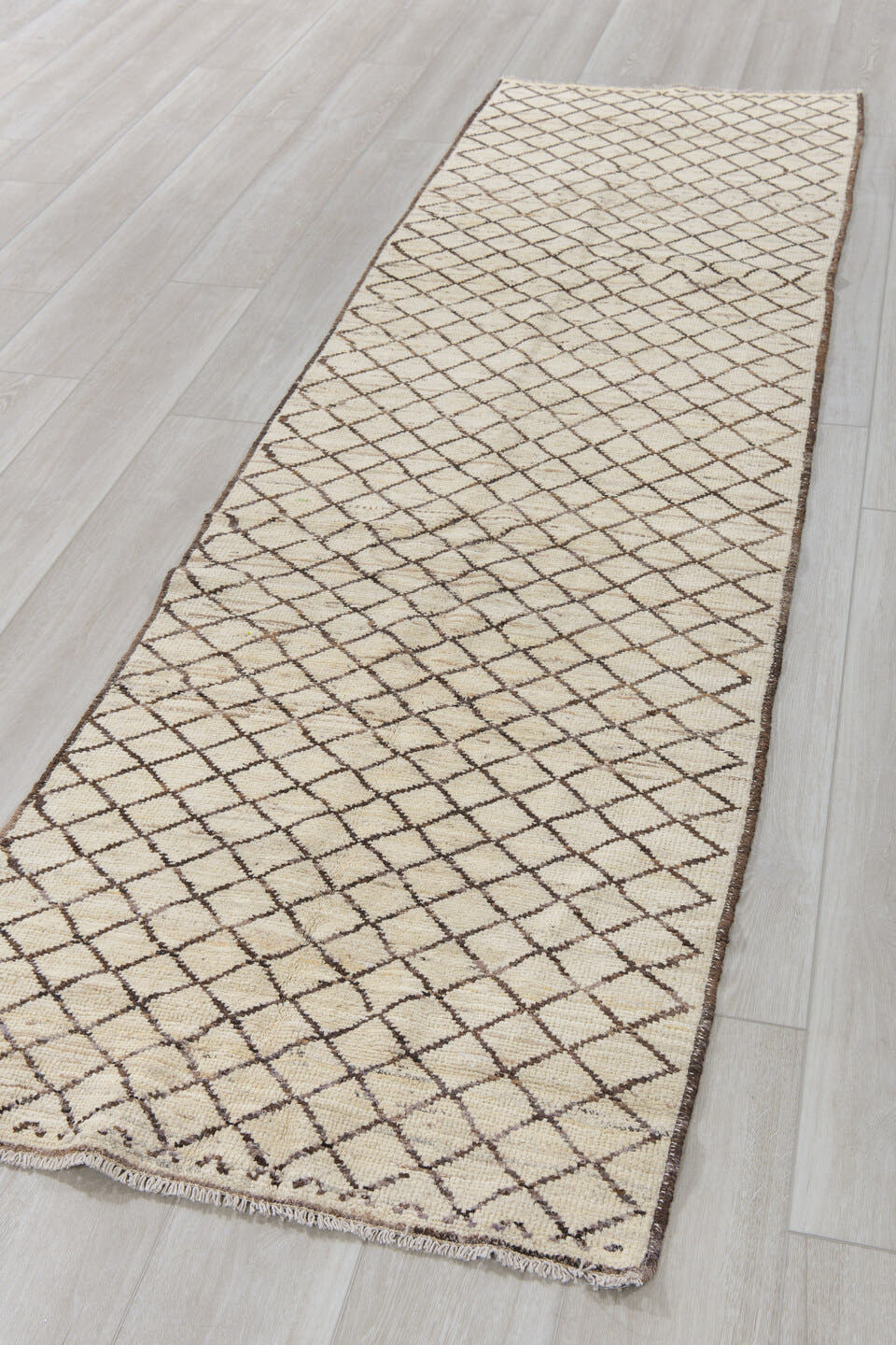 2' x 9' one-of-a-kind handmade vintage Tulu runner rug. Color palette: ivory, brown, taupe, beige, gray