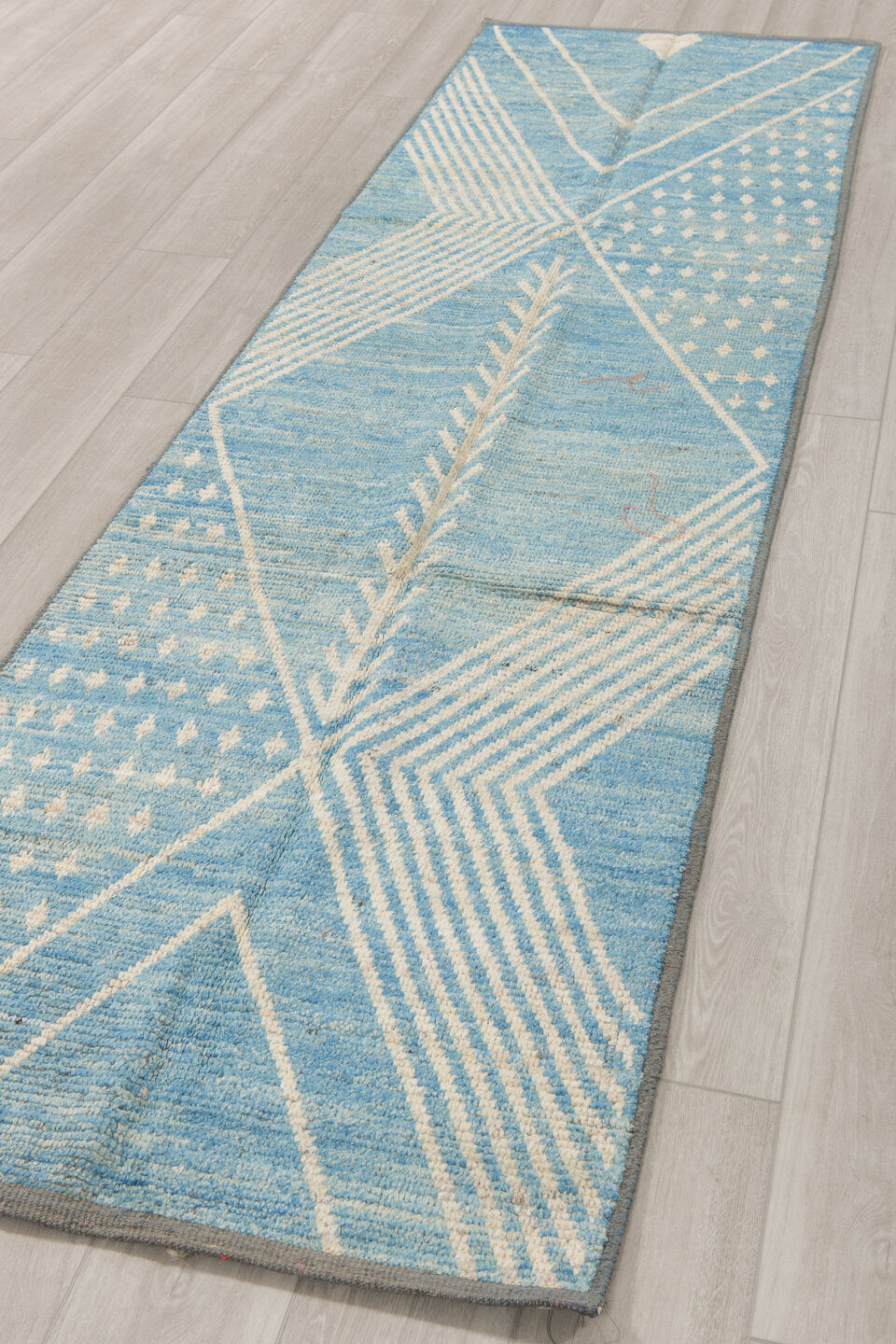 2' x 9' one-of-a-kind handmade vintage Tulu runner rug. Color palette: sky blue, ivory, slate, light blue, gray