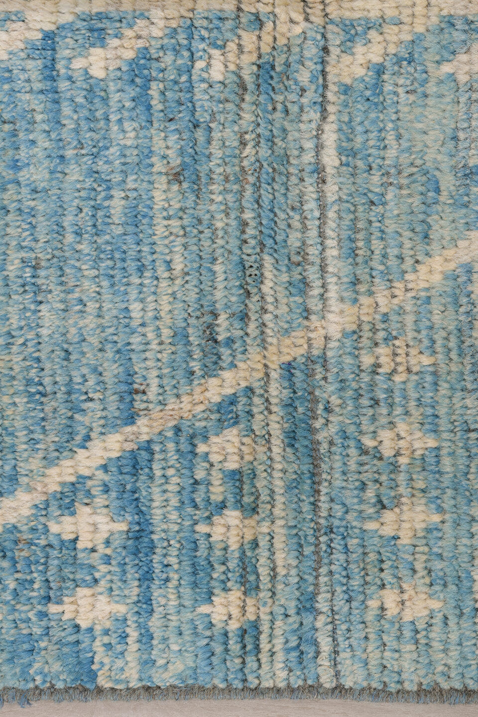 2' x 9' one-of-a-kind handmade vintage Tulu runner rug. Color palette: sky blue, ivory, slate, light blue, gray
