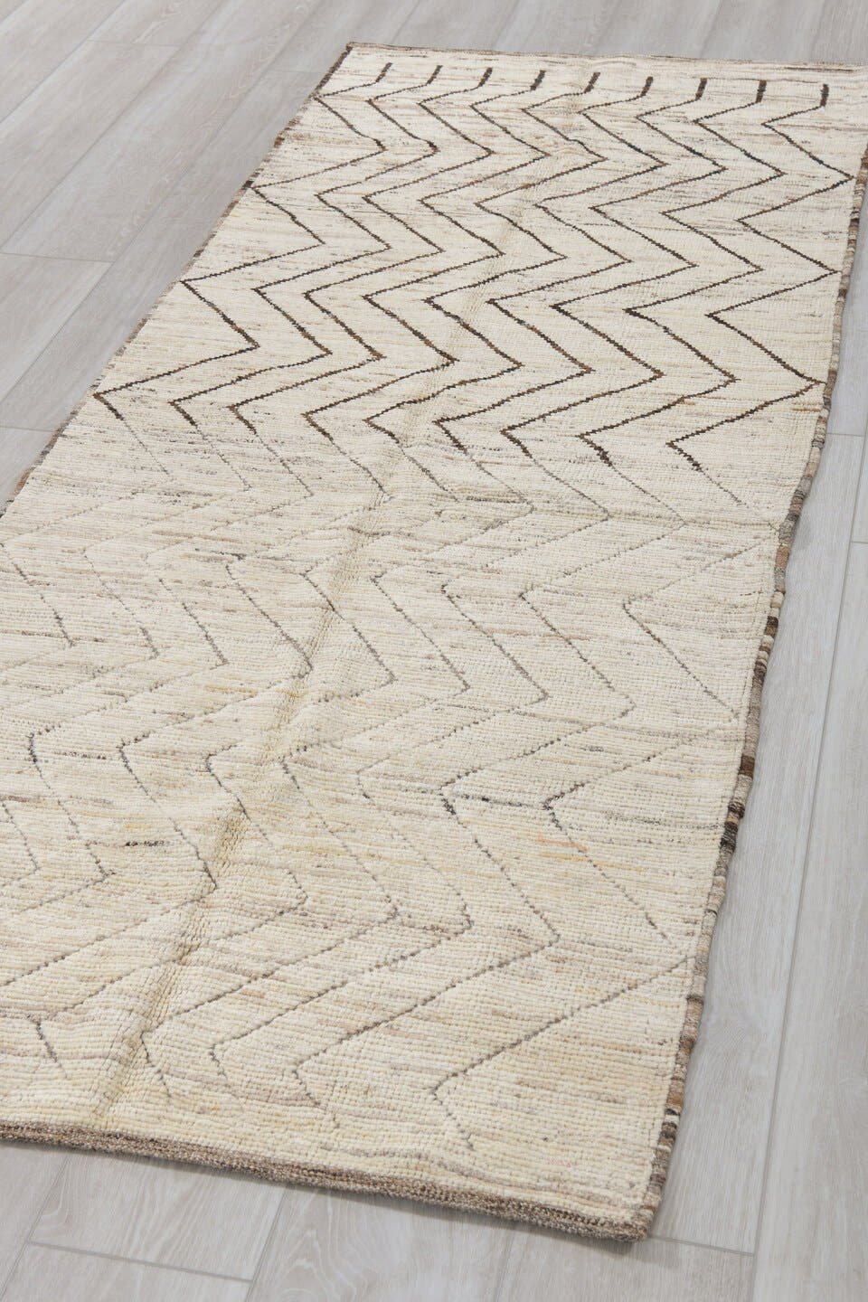 3' x 8' one-of-a-kind handmade vintage Tulu runner rug. Color palette: ivory, taupe, dark brown, cream, beige, gray, brown
