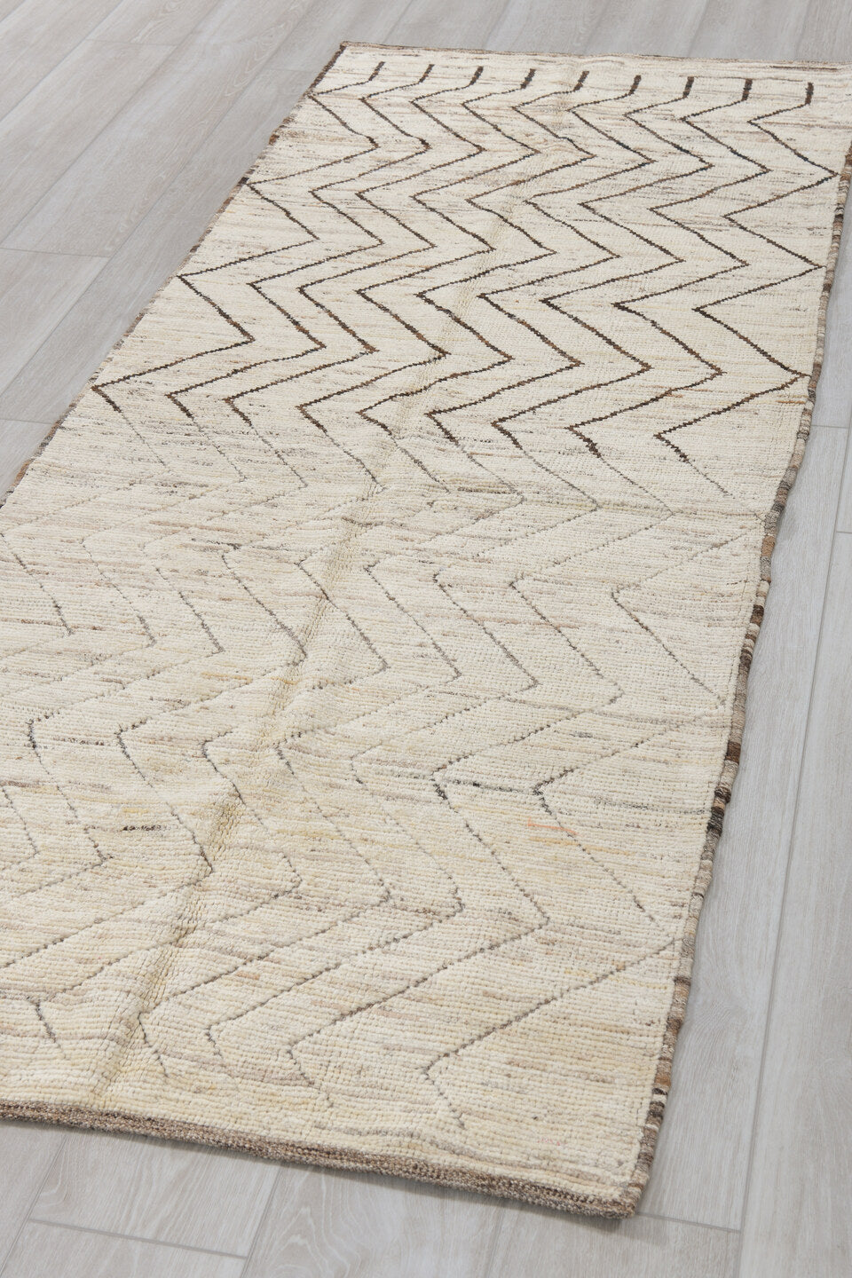 3' x 8' one-of-a-kind handmade vintage Tulu runner rug. Color palette: ivory, taupe, dark brown, cream, beige, gray, brown