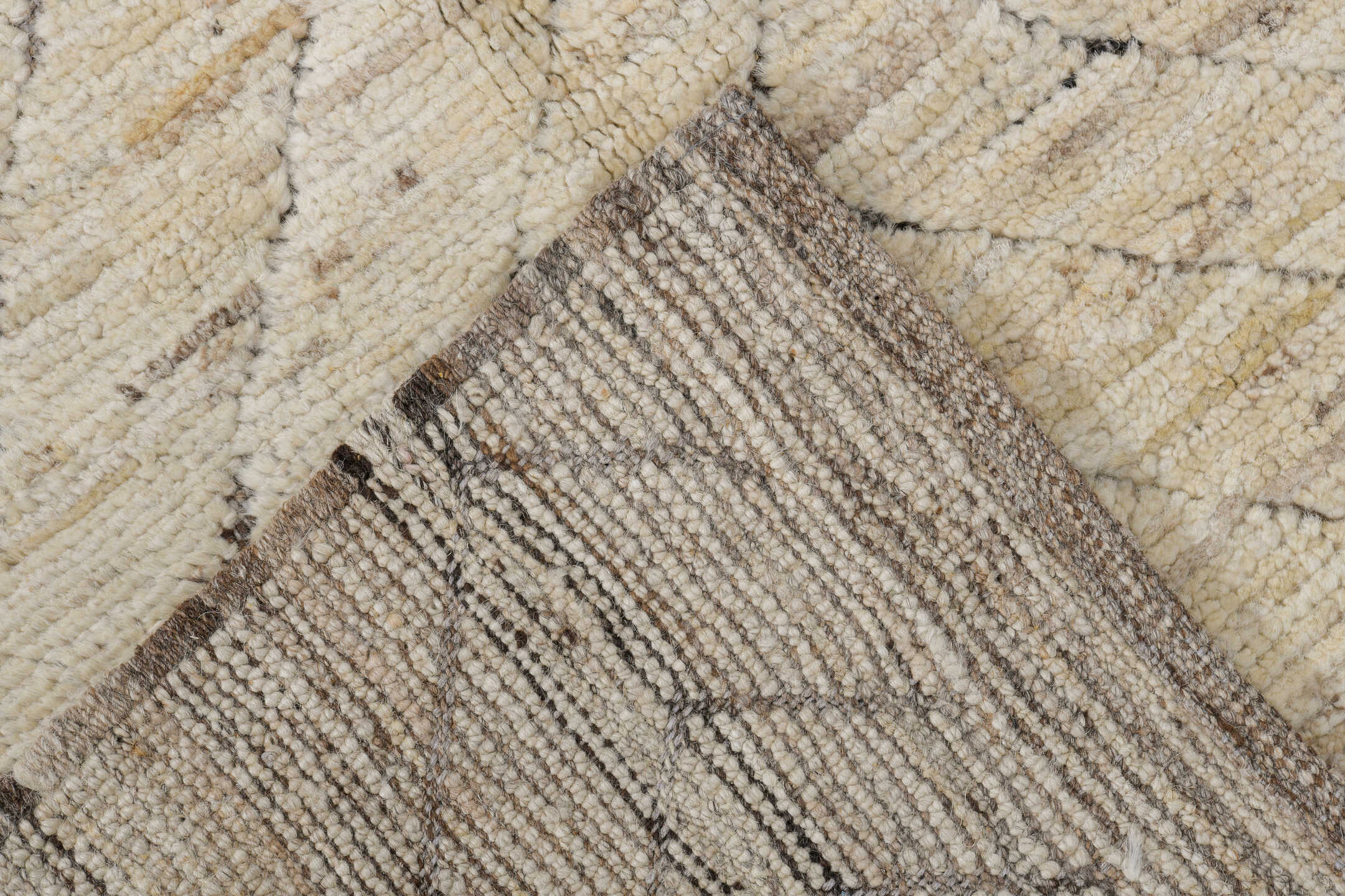 3' x 8' one-of-a-kind handmade vintage Tulu runner rug. Color palette: ivory, taupe, dark brown, cream, beige, gray, brown