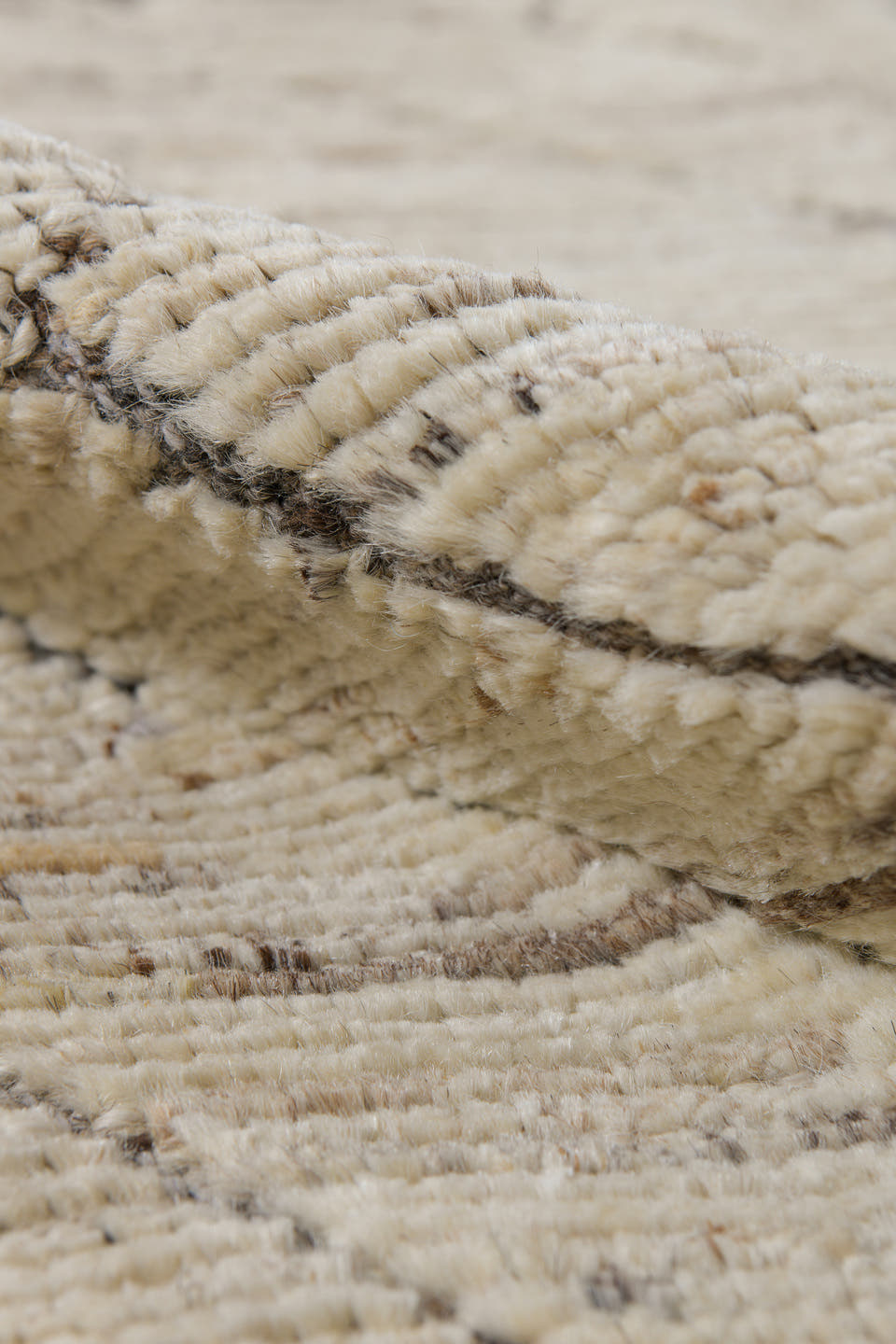 3' x 8' one-of-a-kind handmade vintage Tulu runner rug. Color palette: ivory, taupe, dark brown, cream, beige, gray, brown