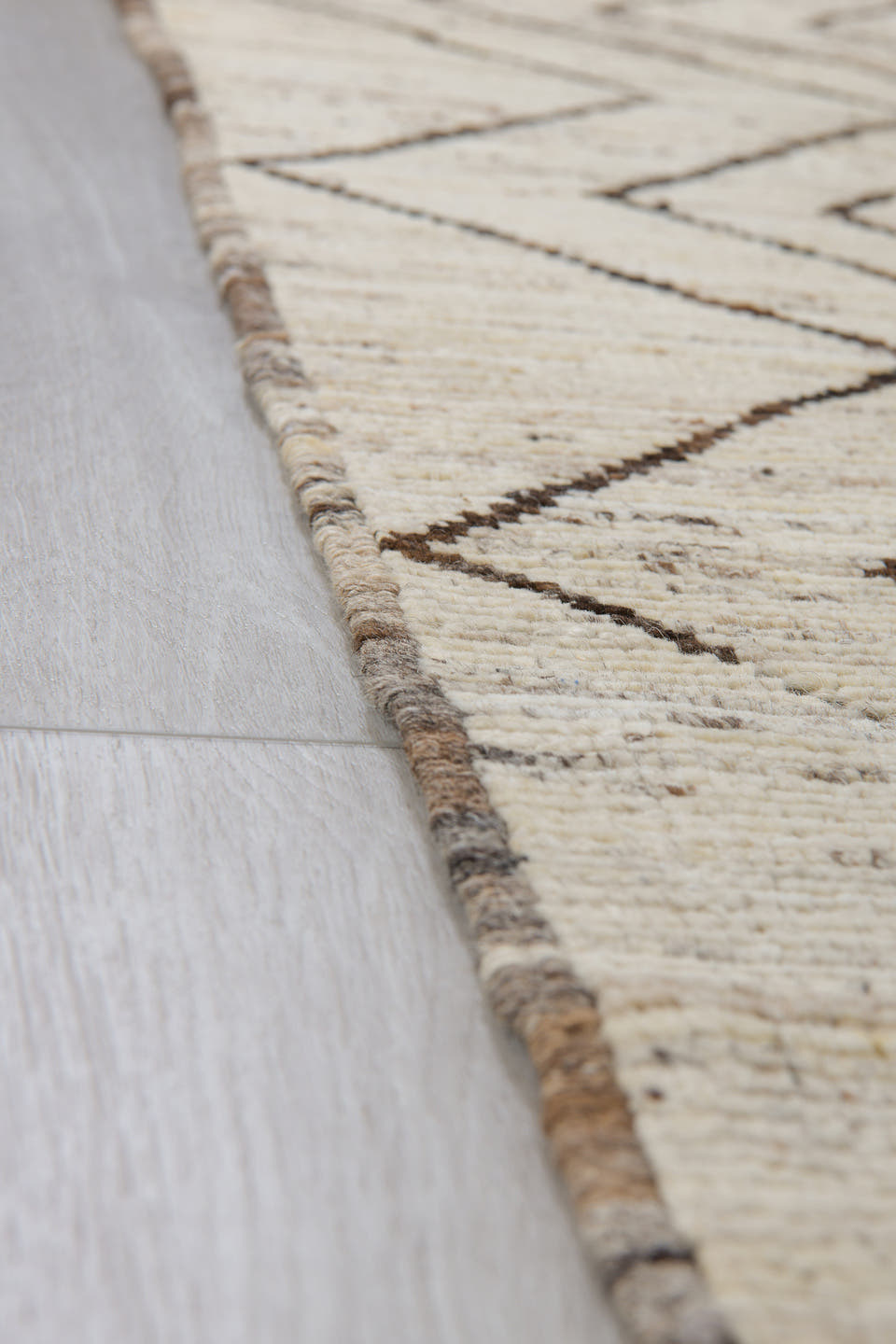 3' x 8' one-of-a-kind handmade vintage Tulu runner rug. Color palette: ivory, taupe, dark brown, cream, beige, gray, brown