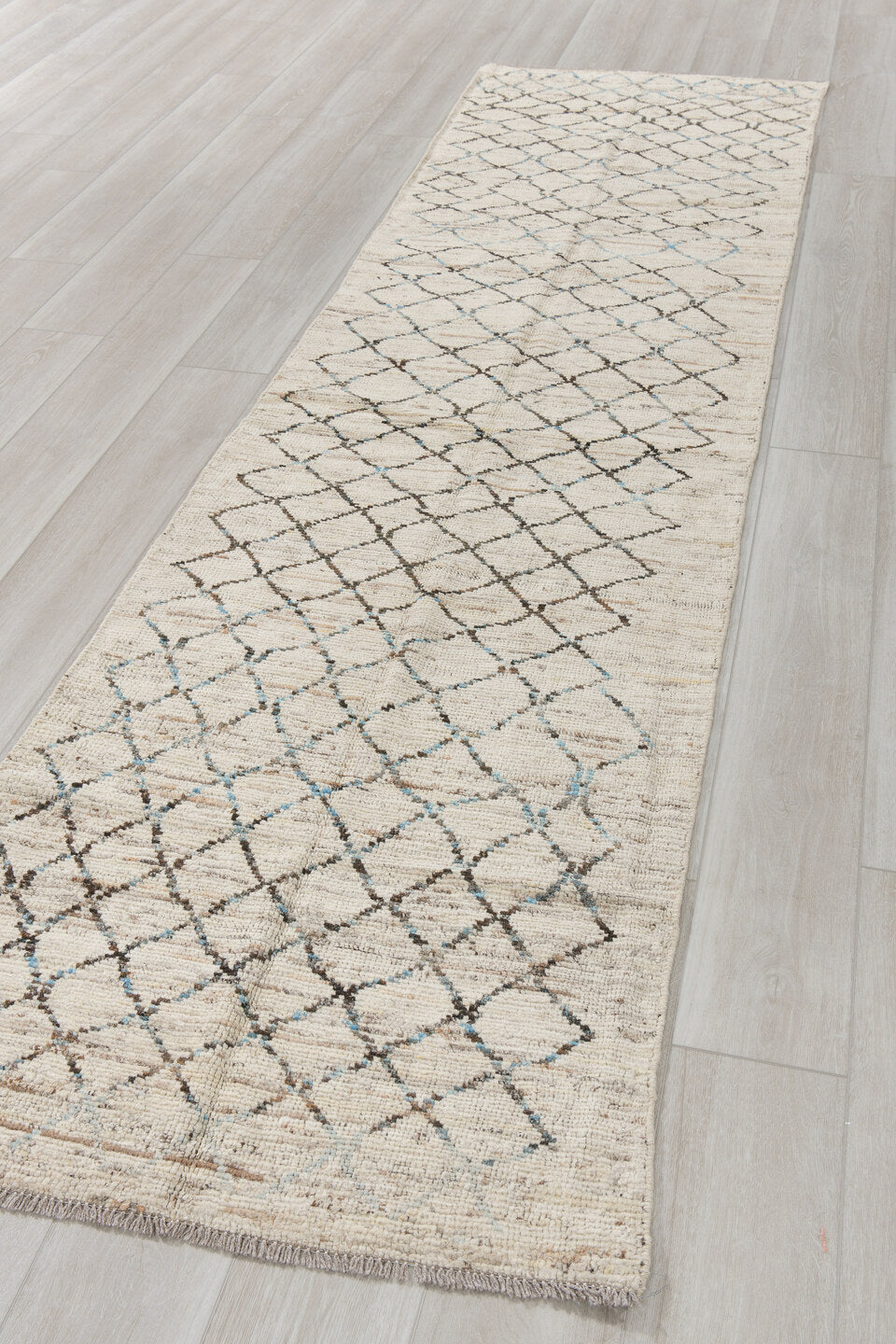 3' x 11' one-of-a-kind handmade vintage Tulu runner rug. Color palette: ivory, charcoal, pale blue, taupe, cream, black