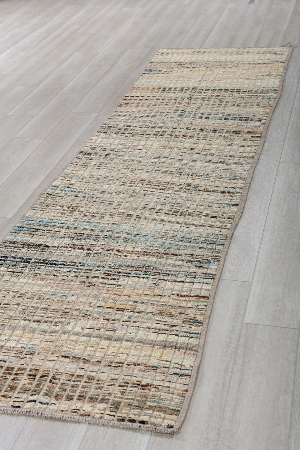 3' x 11' one-of-a-kind handmade vintage Tulu runner rug. Color palette: ivory, taupe, charcoal, slate, blue, rust, beige